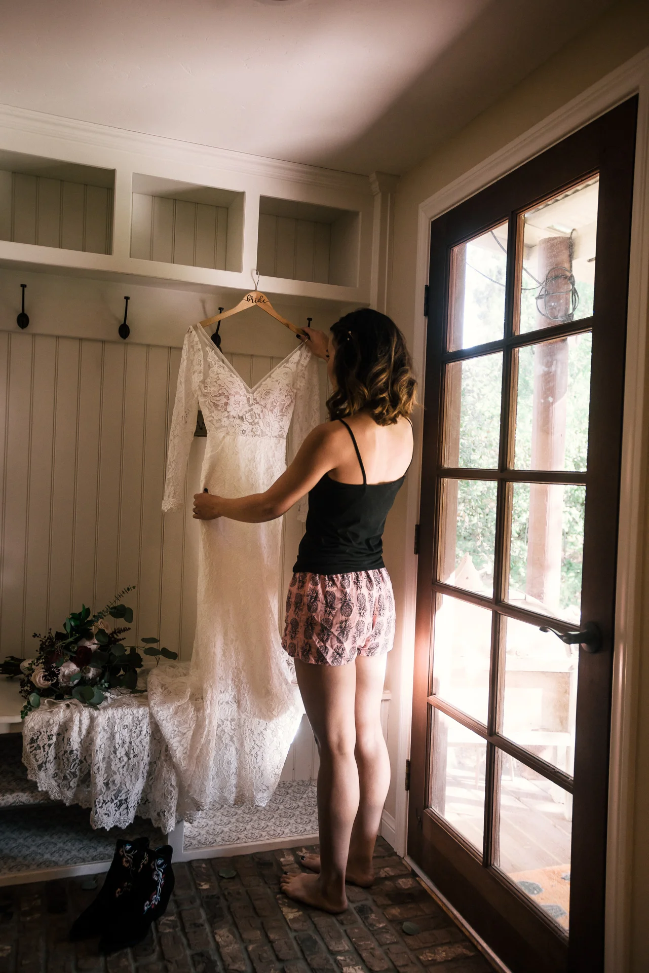 Bride gets her wedding dress at rustic pymm ranch wedding venue in winchester california