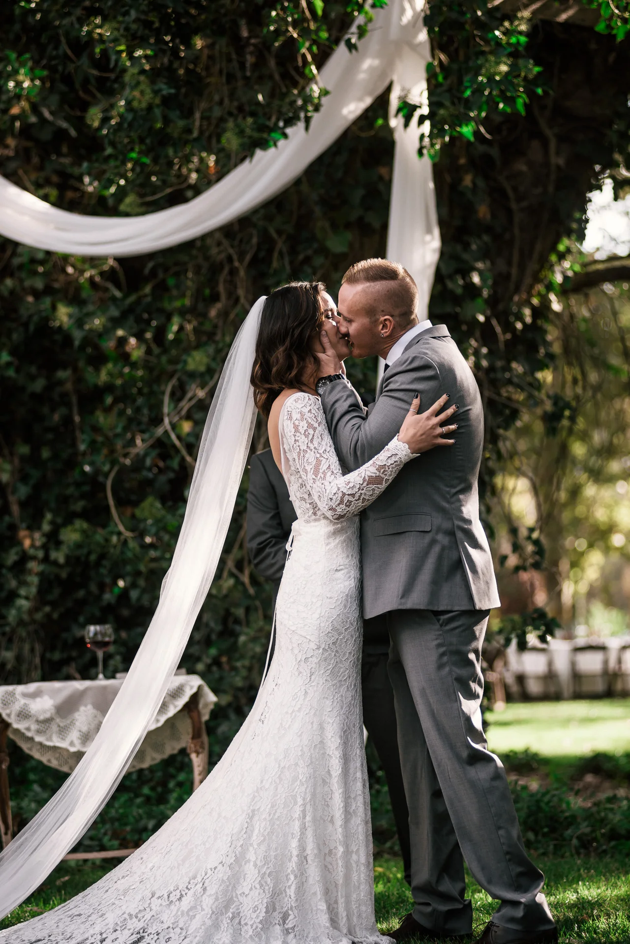 the first kiss at rustic pymm ranch wedding venue in winchester california