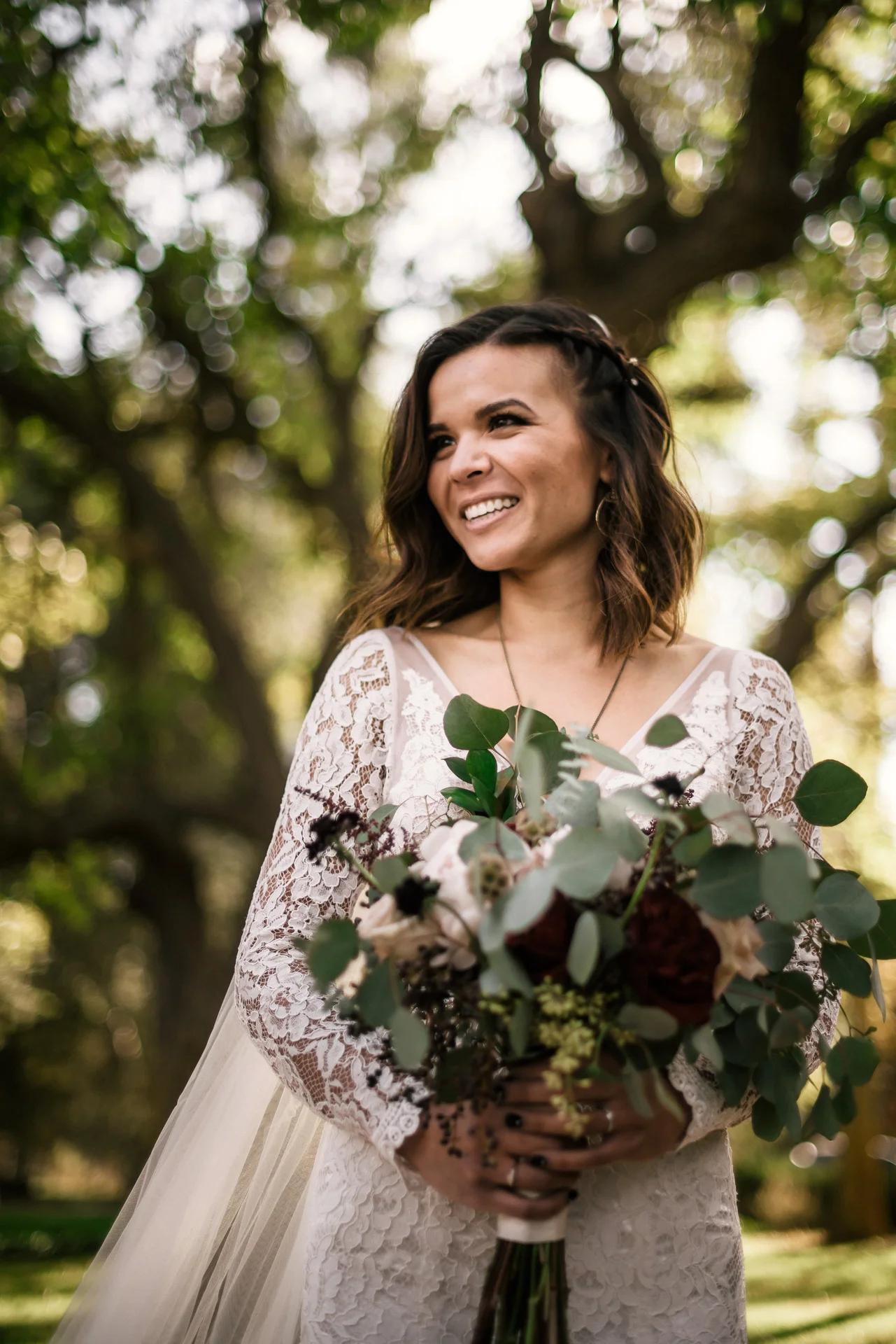 happy bride smiles at rustic pymm ranch wedding venue in winchester california