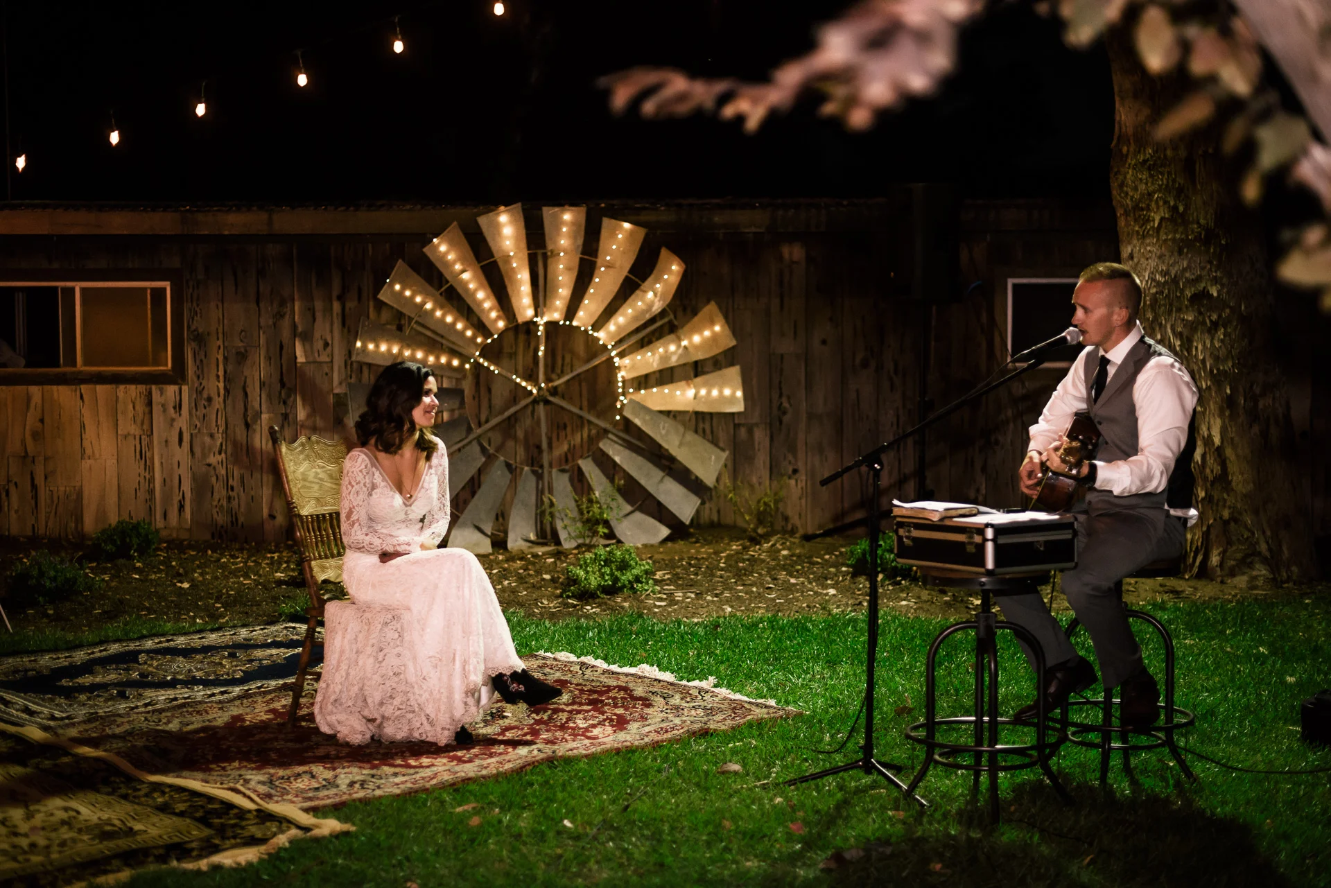 Groom sings a song to his bride at rustic pymm ranch wedding venue in winchester california