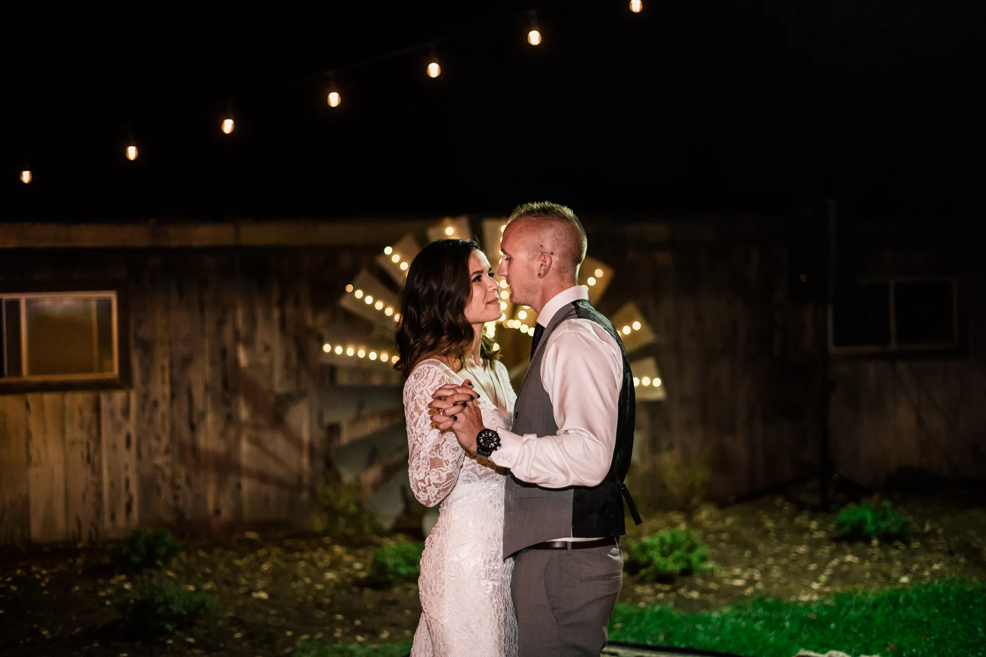 Bride and groom's first dance at rustic pymm ranch wedding venue in winchester california