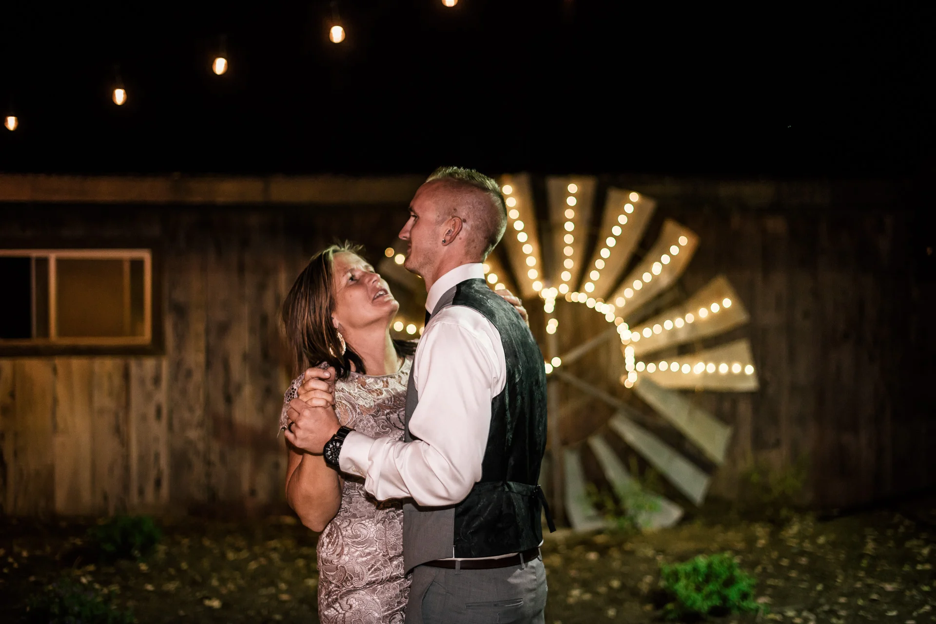 Groom dances with his mother at rustic pymm ranch wedding venue in winchester california