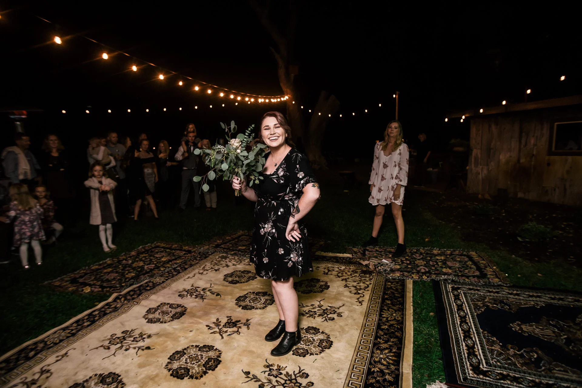 lucky guest who caught bouquet at rustic pymm ranch wedding venue in winchester california