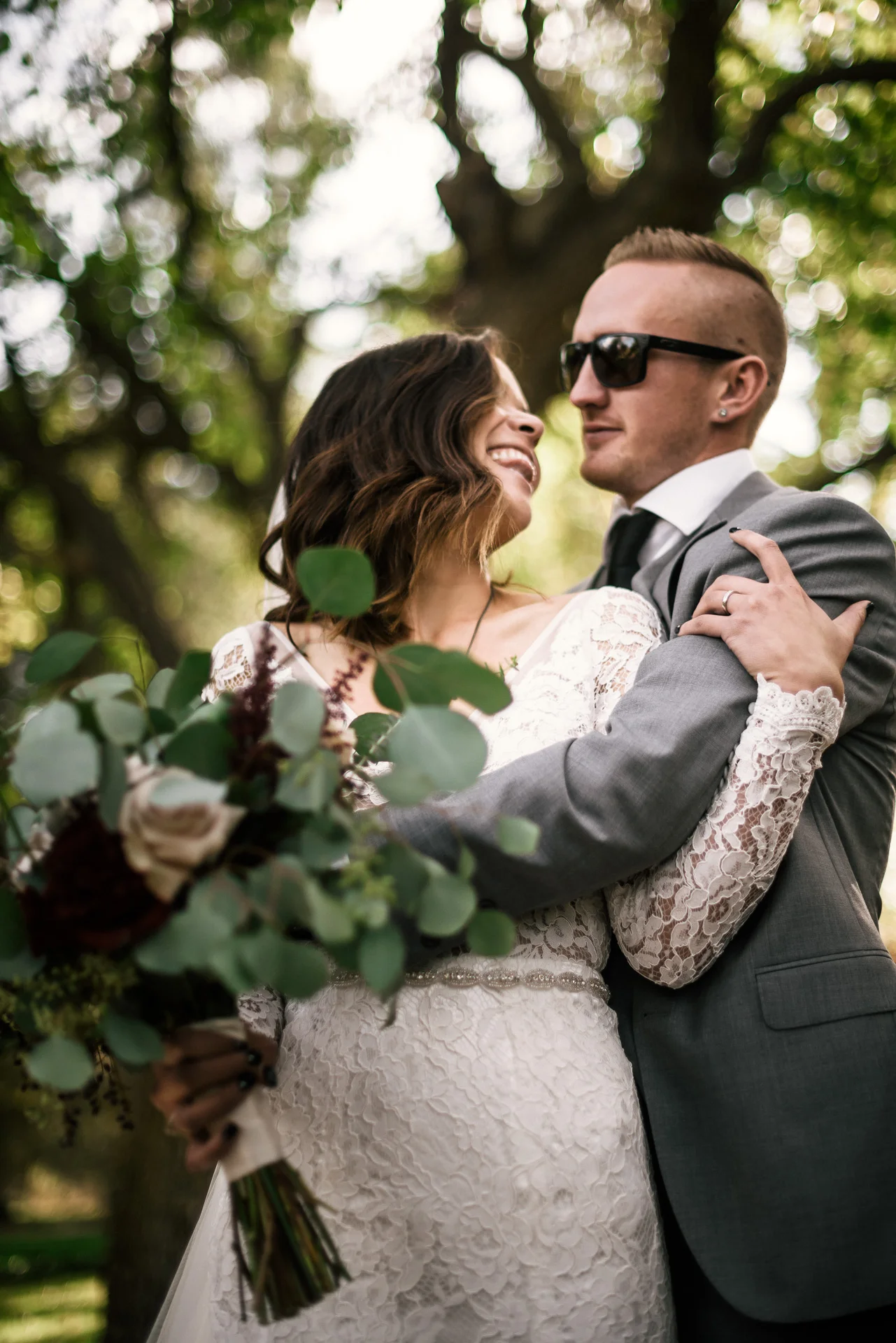 happy bride looks at her groom at rustic pymm ranch wedding venue in winchester california