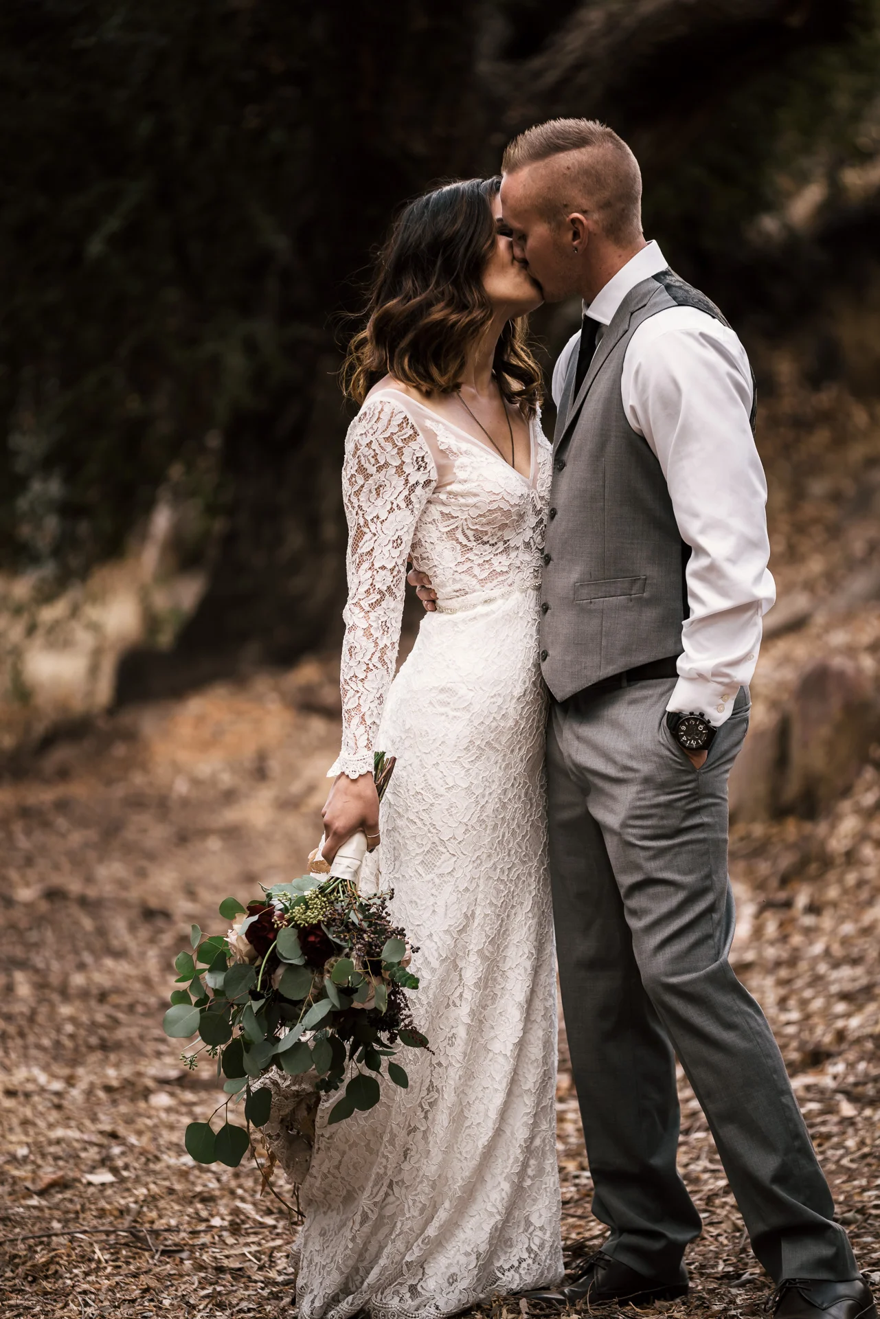 romantic kiss at rustic pymm ranch wedding venue in winchester california