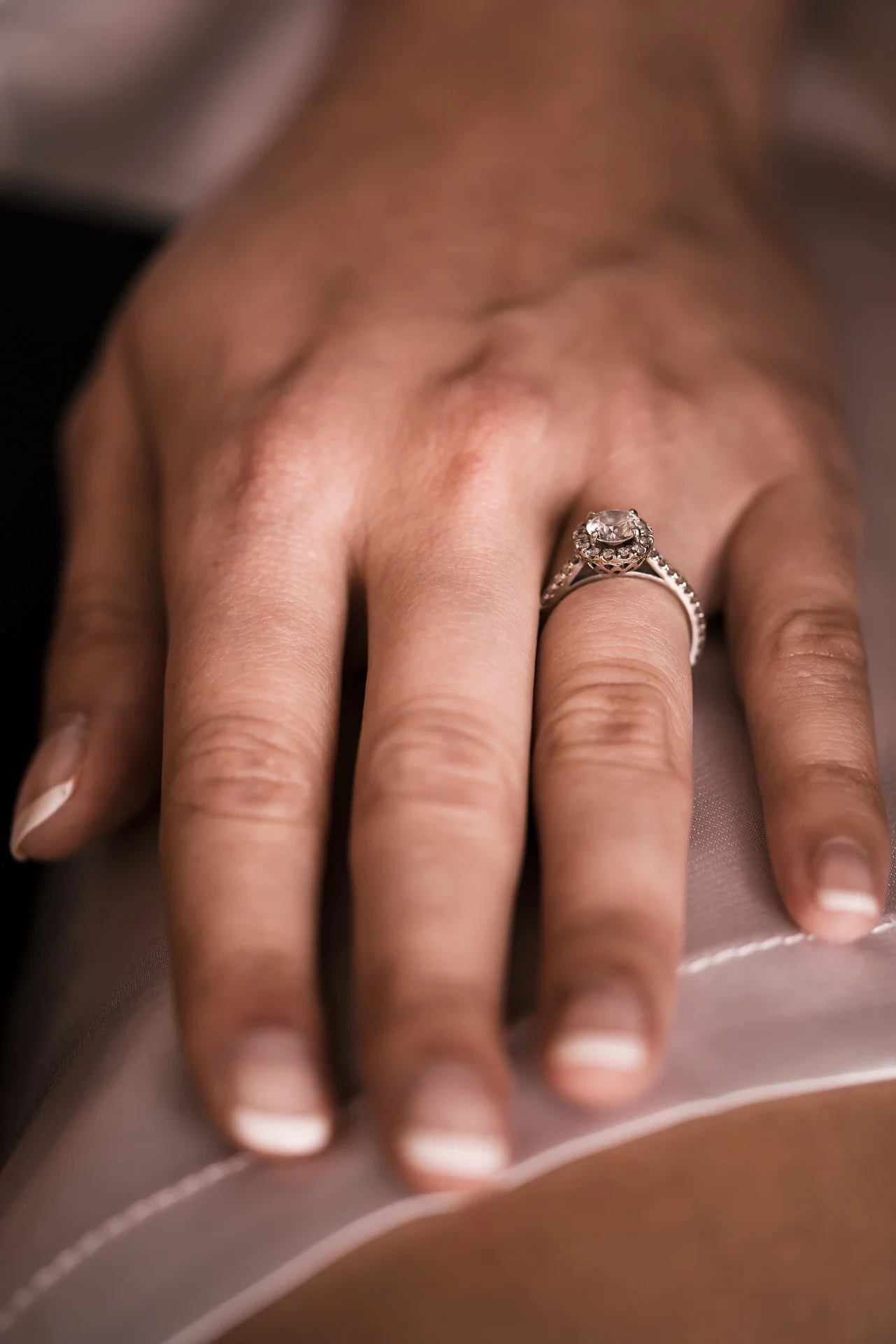 Engagement ring on brides finger before wedding at the Twin Oaks Golf course in san marcos, San diegos premier wedding venue