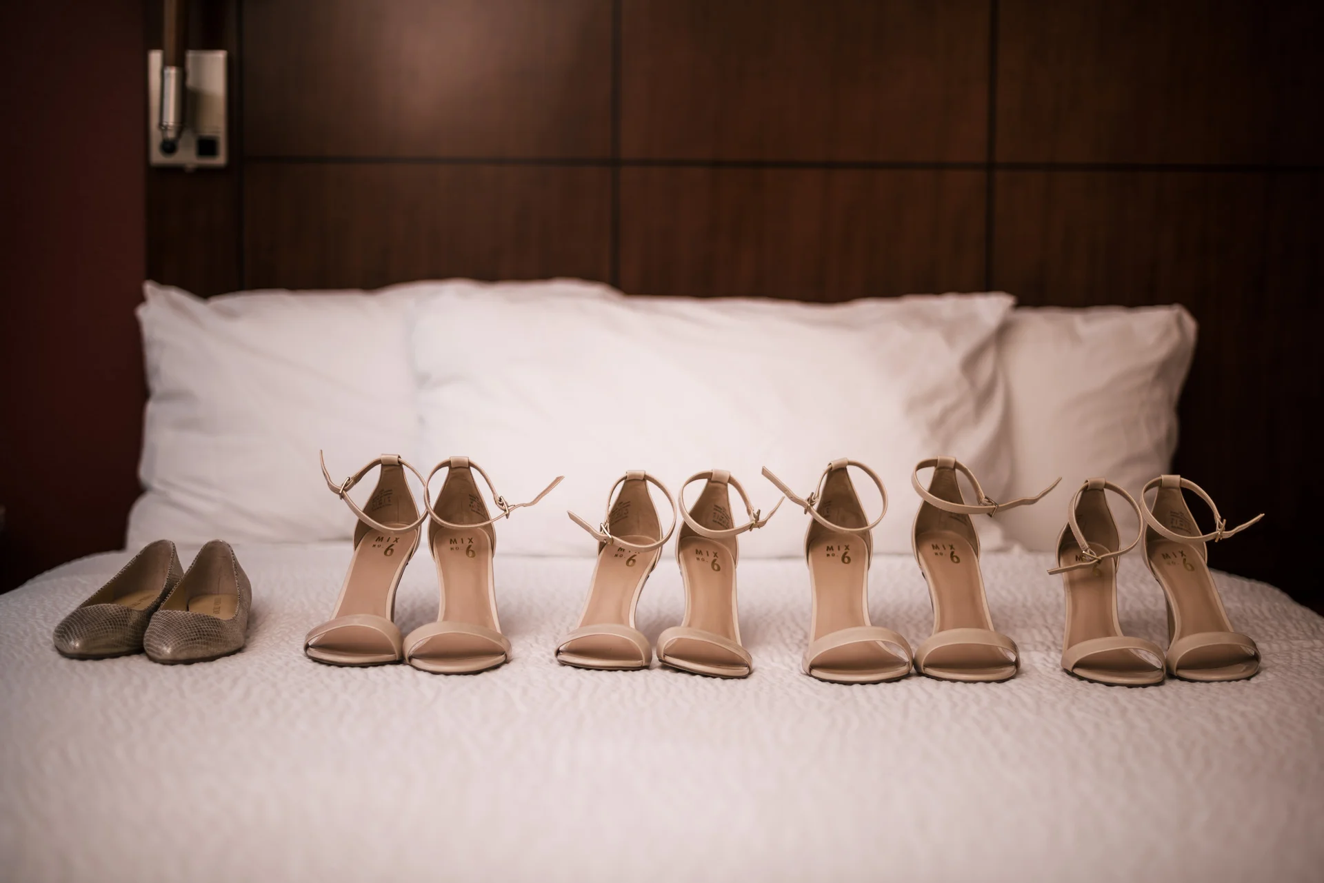 brides shoes among her bridesmaids heels at the Twin Oaks Golf course in san marcos, San diegos premier wedding venue