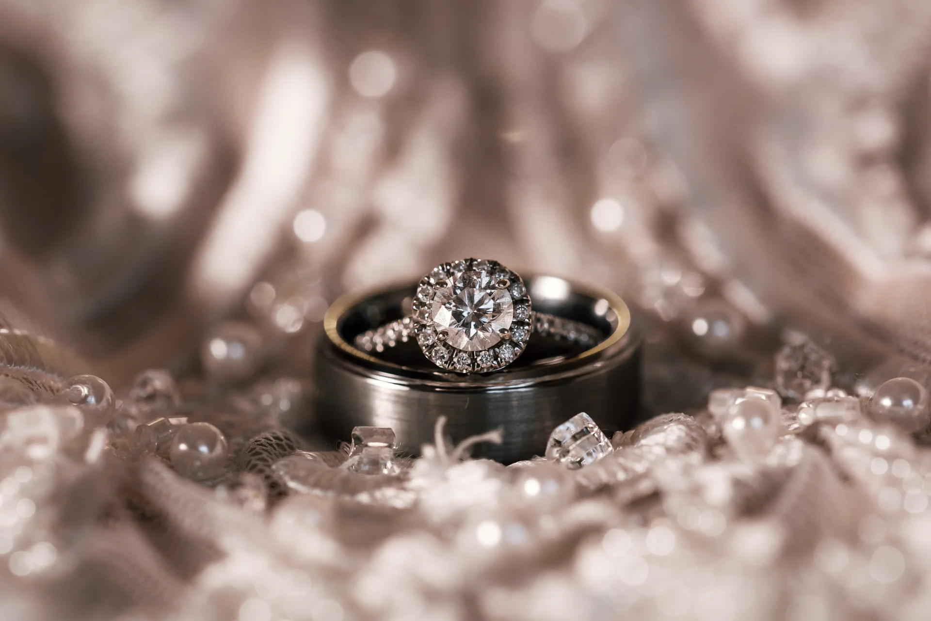 elegant diamond ring on the brides wedding dress at the Twin Oaks Golf course in san marcos, San diegos premier wedding venue