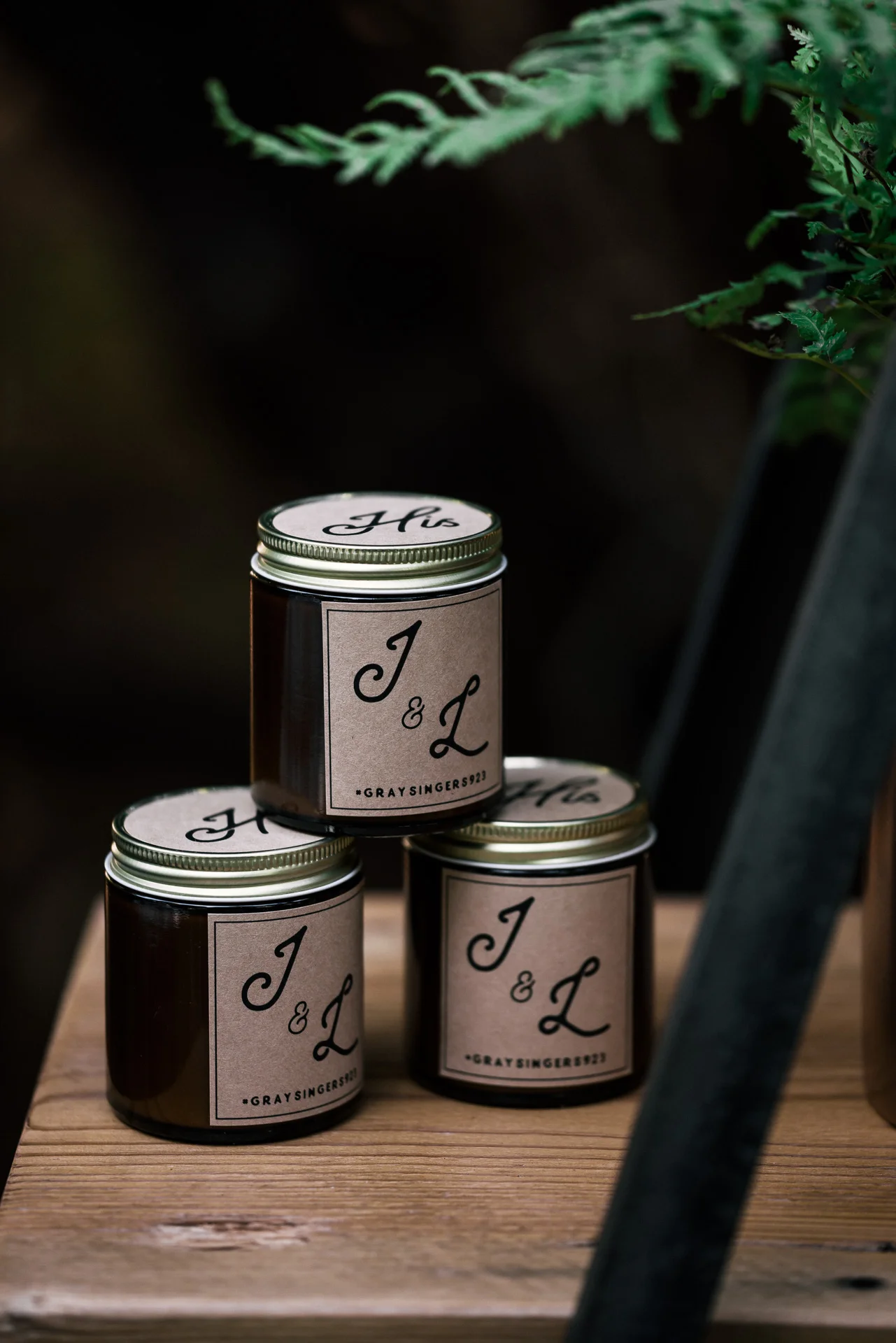 him and her's handmade candle wedding favors shot by wedding photographer at the charming St. George Hotel in Volcano California