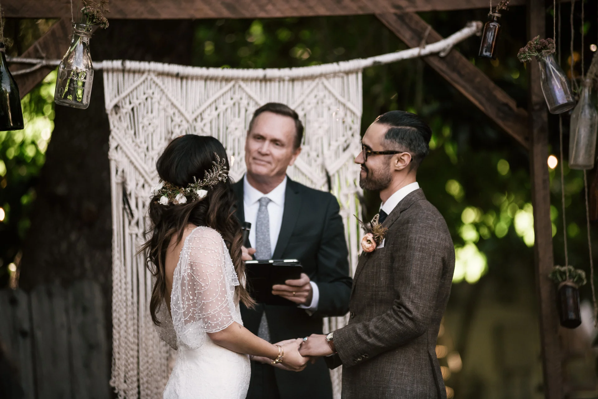 bride looks at her father shot by wedding photographer at the charming St. George Hotel in Volcano California