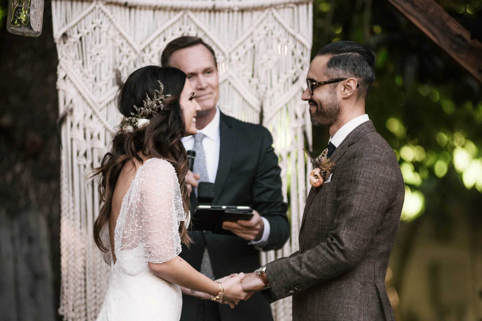 bride and groom share a sweet moment shot by wedding photographer at the charming St. George Hotel in Volcano California