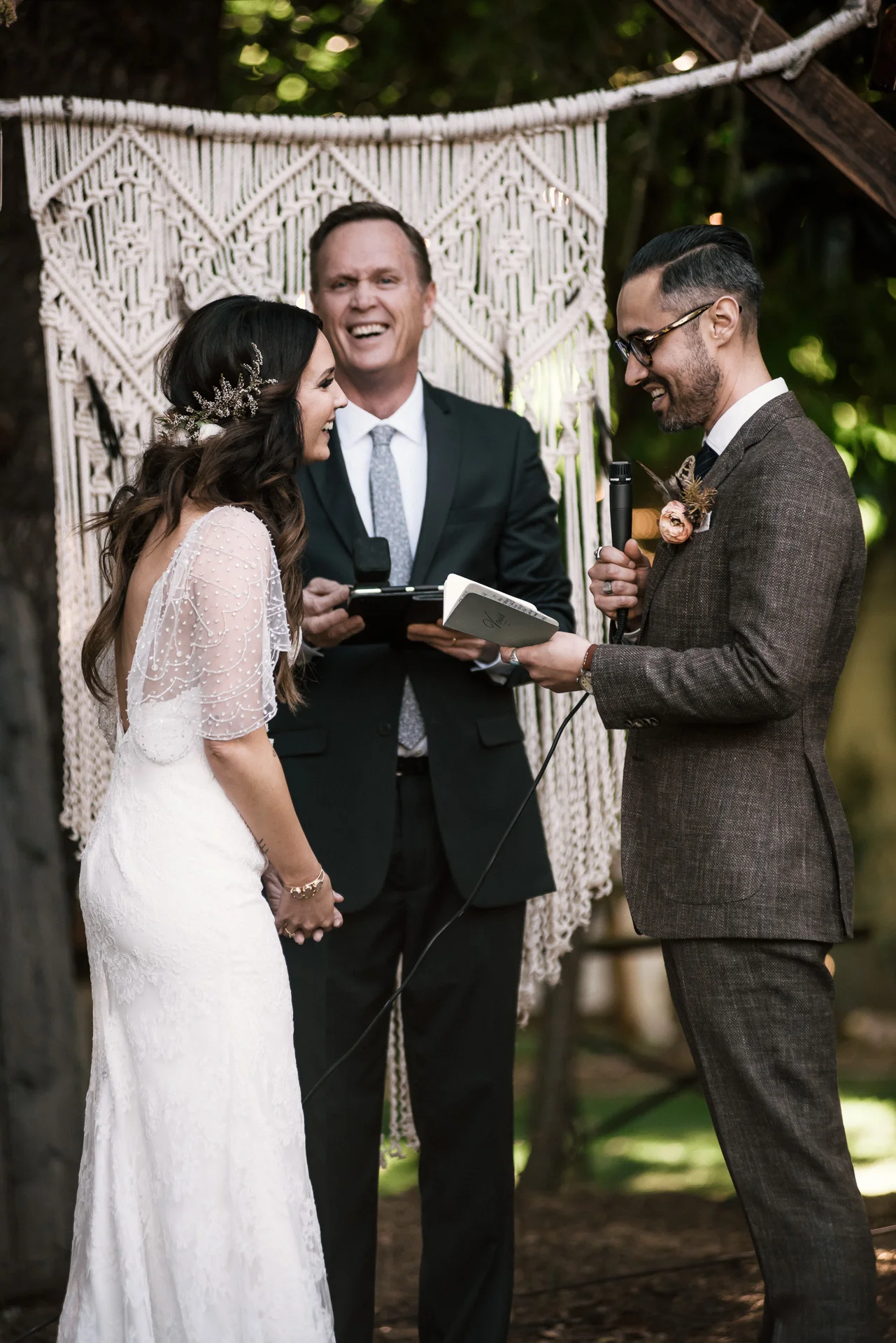 bride laughs at grooms joke shot by wedding photographer at the charming St. George Hotel in Volcano California