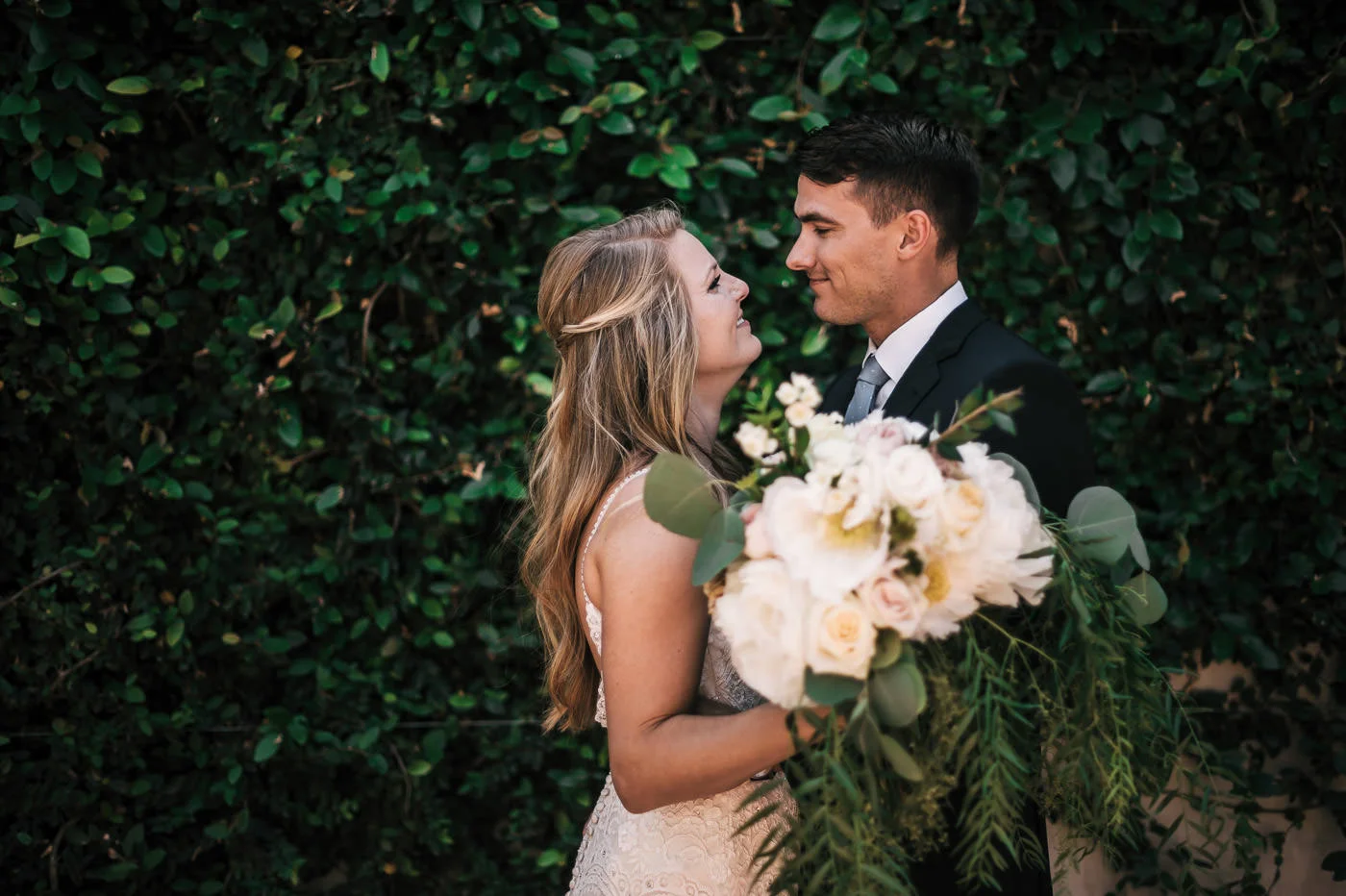 Couple has a romantic first look before the wedding ceremony at their Temecula, wedding.