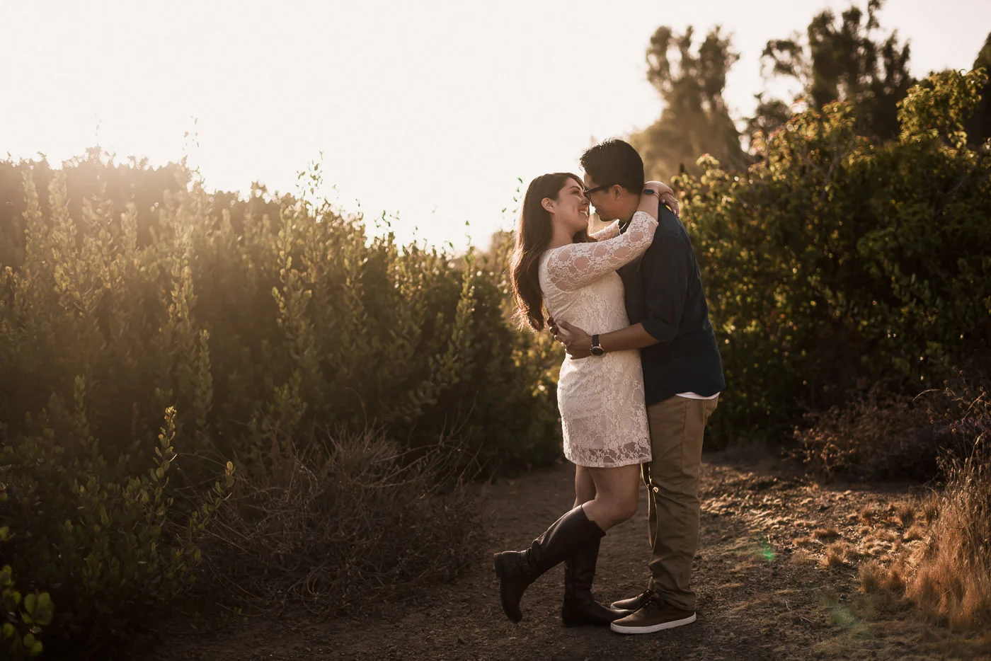 Lovers hold each other tight and have an intimate moment to themselves at their Malibu elopement