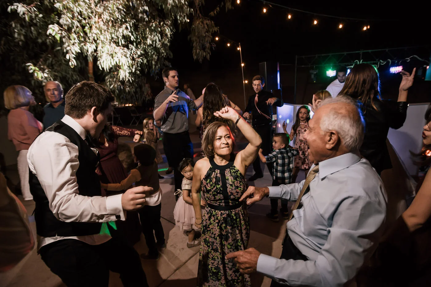Guests tear up the dance floor as the Dj plays at this Temecula wedding reception.