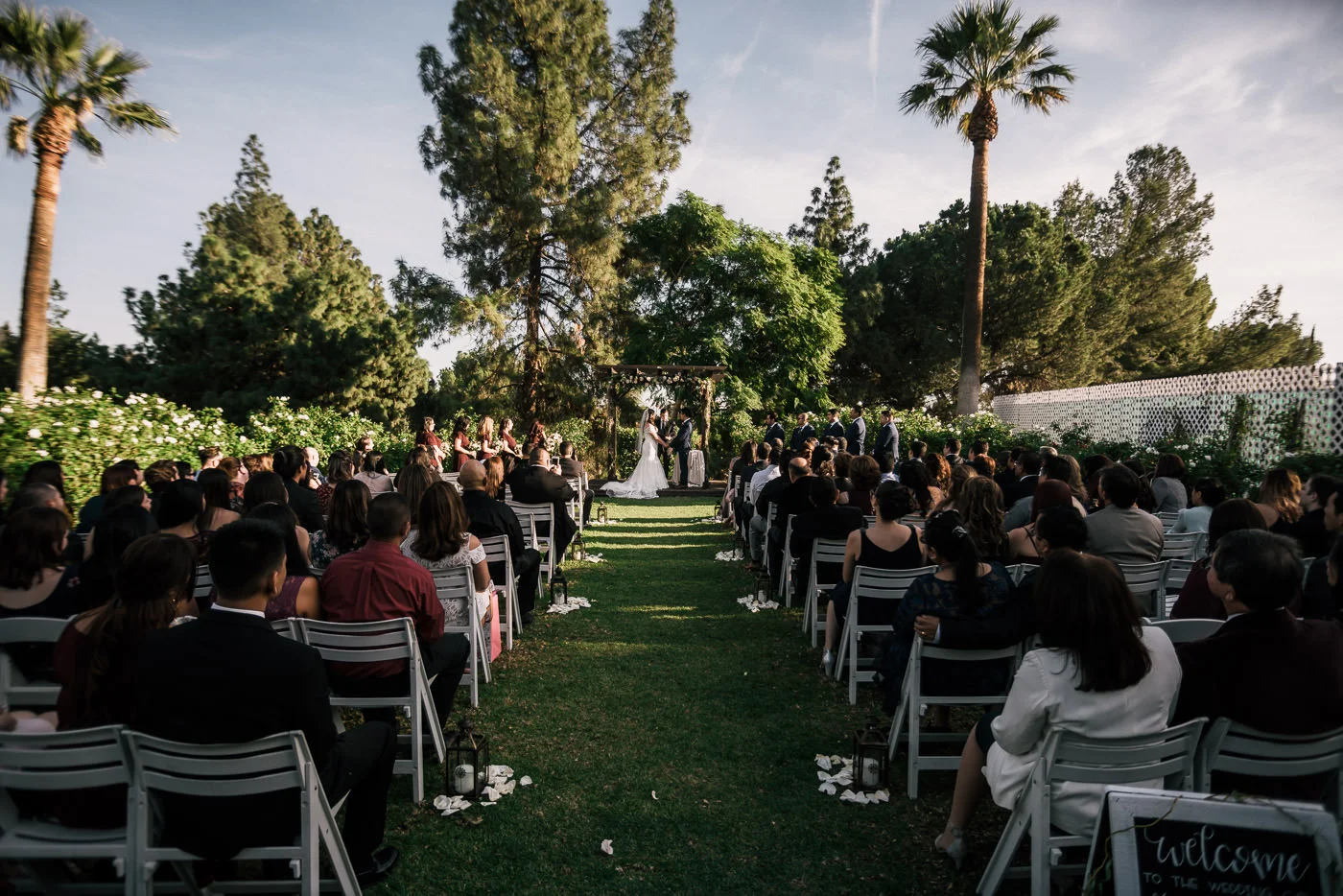 Knollwood country club wedding ceremony rose garden location.
