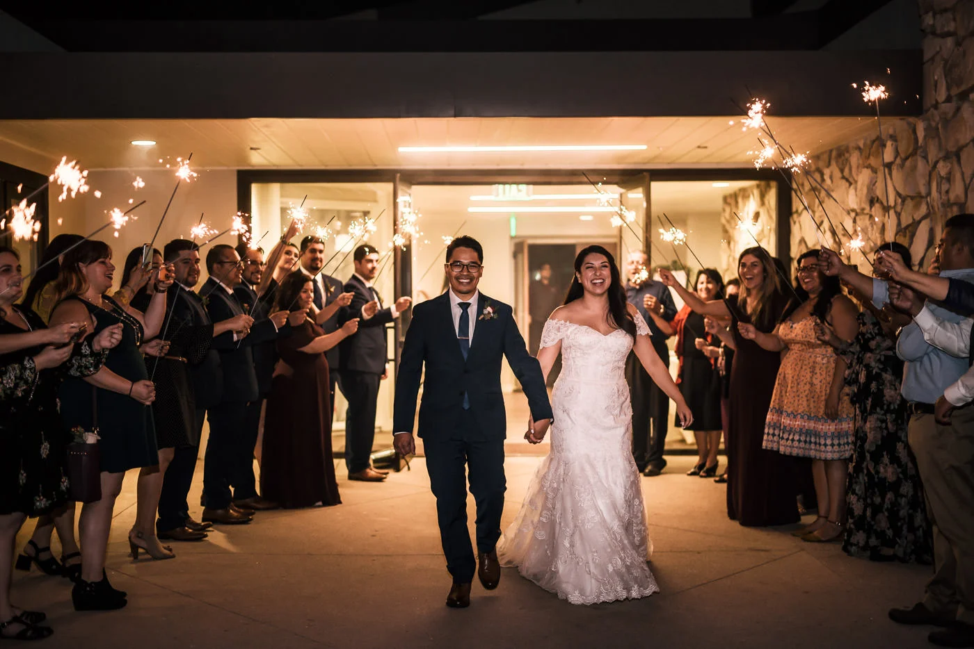 Grand exit with sparklers at this lovely couples Knollwood Country Club Wedding.