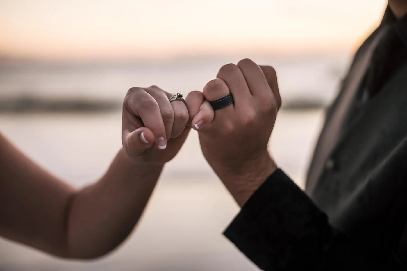 Great wedding photo idea, pinky promise to show off your wedding rings and vow of love.