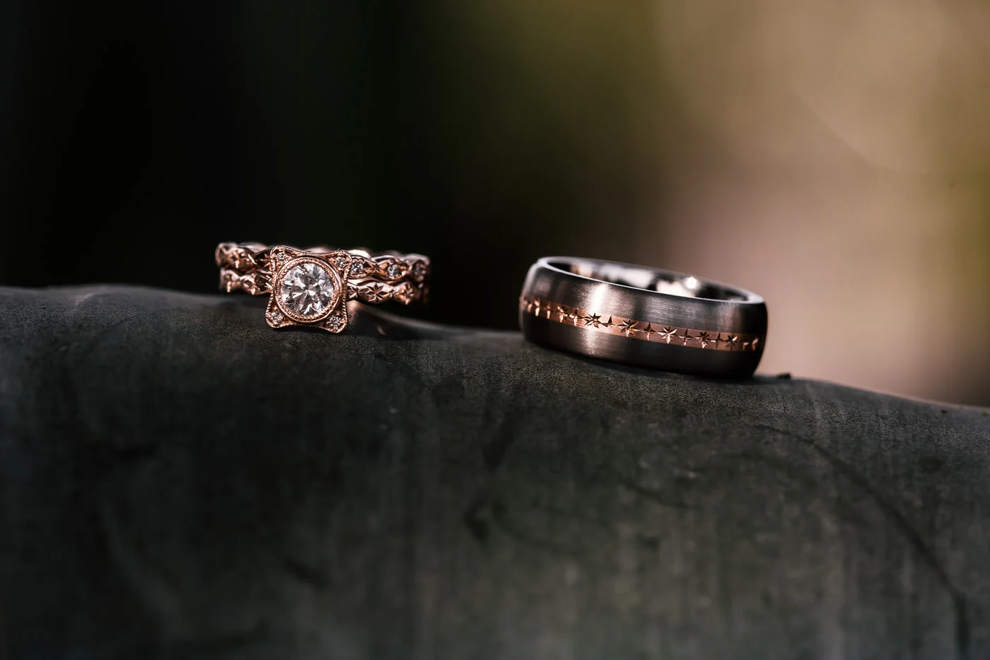 Detial shot of wedding rings resting on an large leaf in Pasadena California.