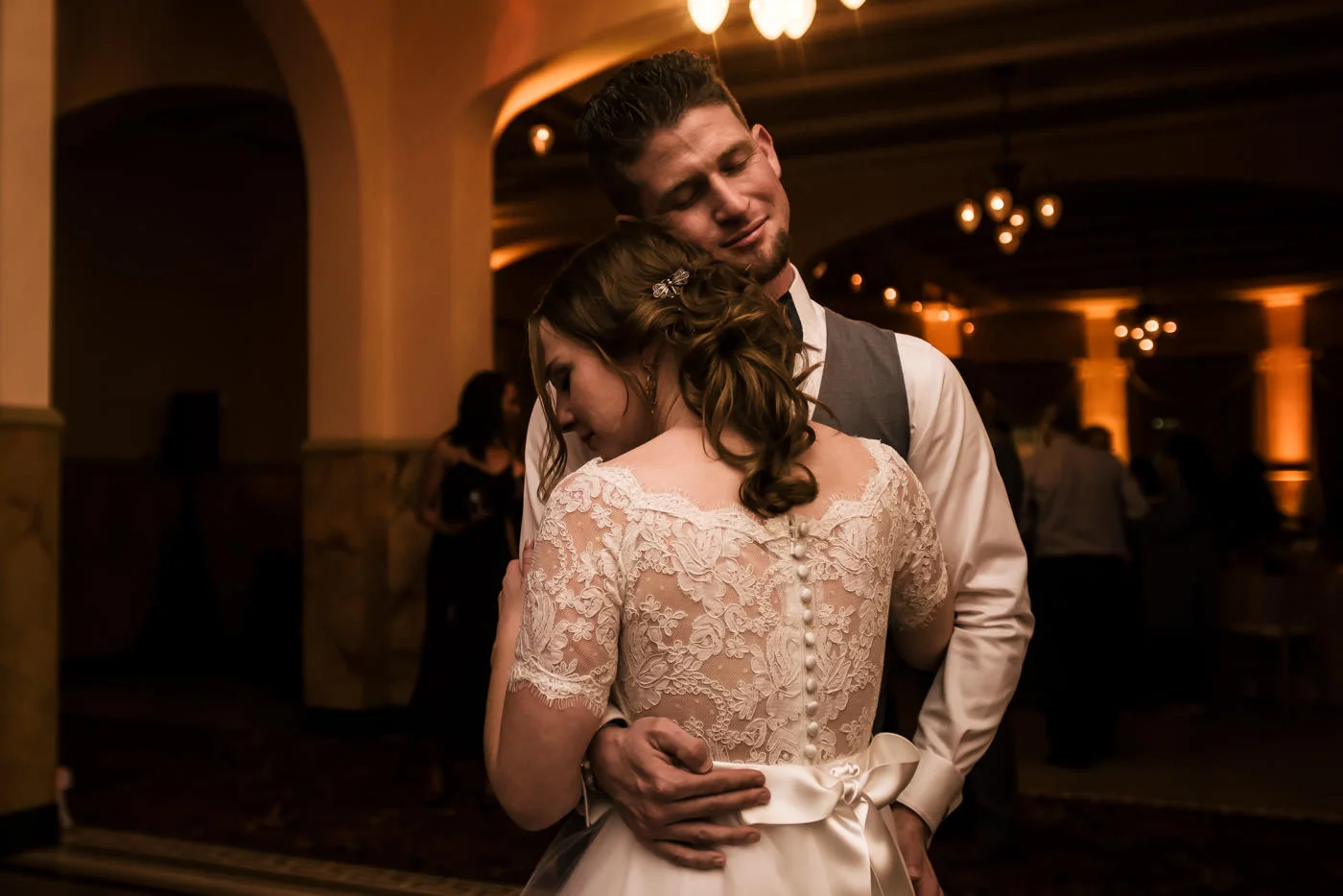 Bride and groom slow dance for the first time after their wedding at the Castle Green in Pasadena California