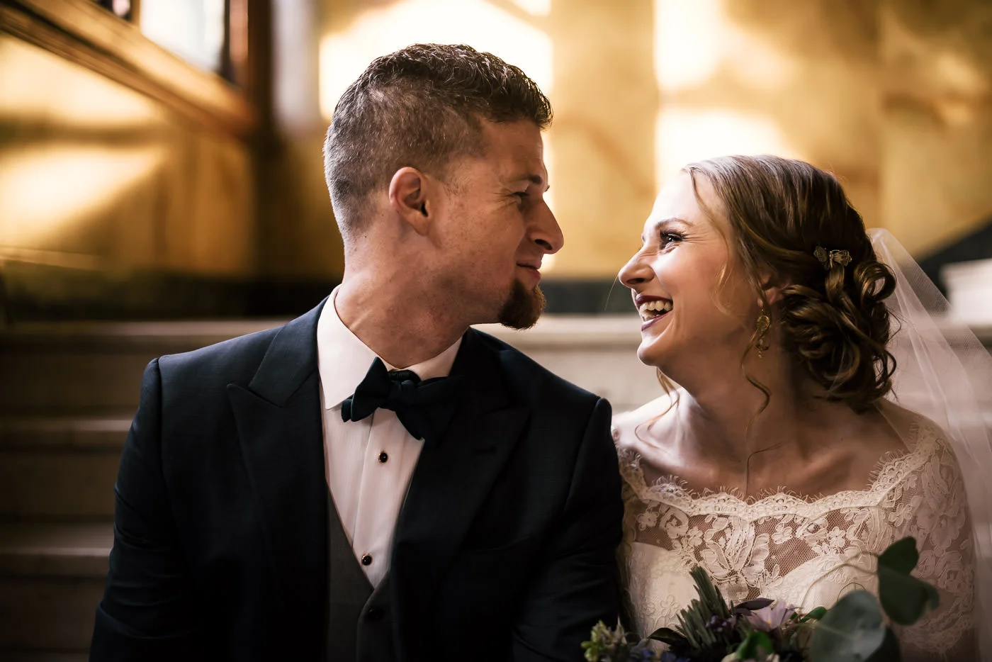 Newlyweds with vintage style share a laugh during their wedding at the historic Castle Green in Pasadena CA.