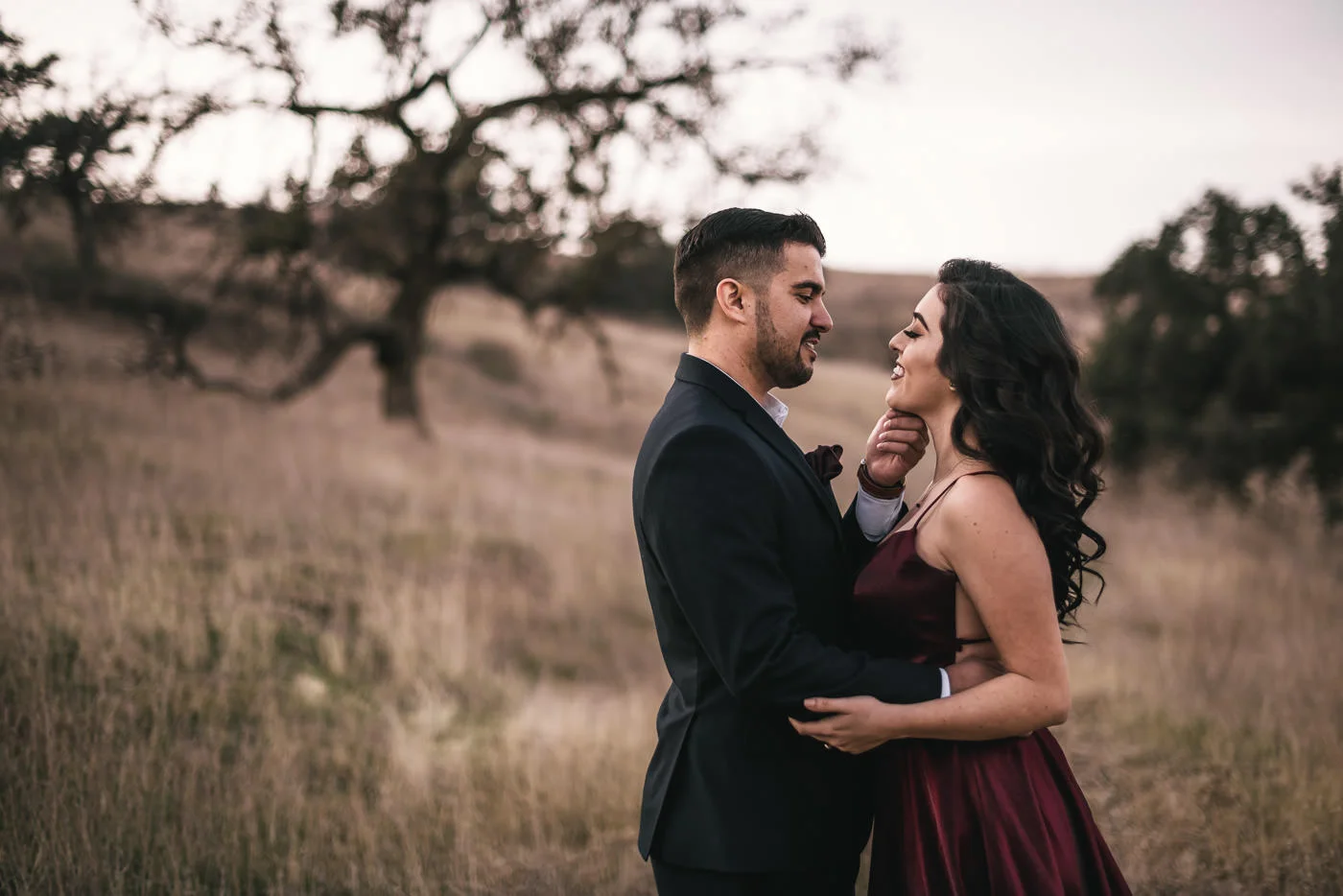 Romantic moment between two people in love in the fields of Malibu.