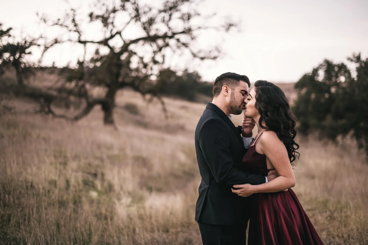 Sweet kiss at sunset in Malibu California.