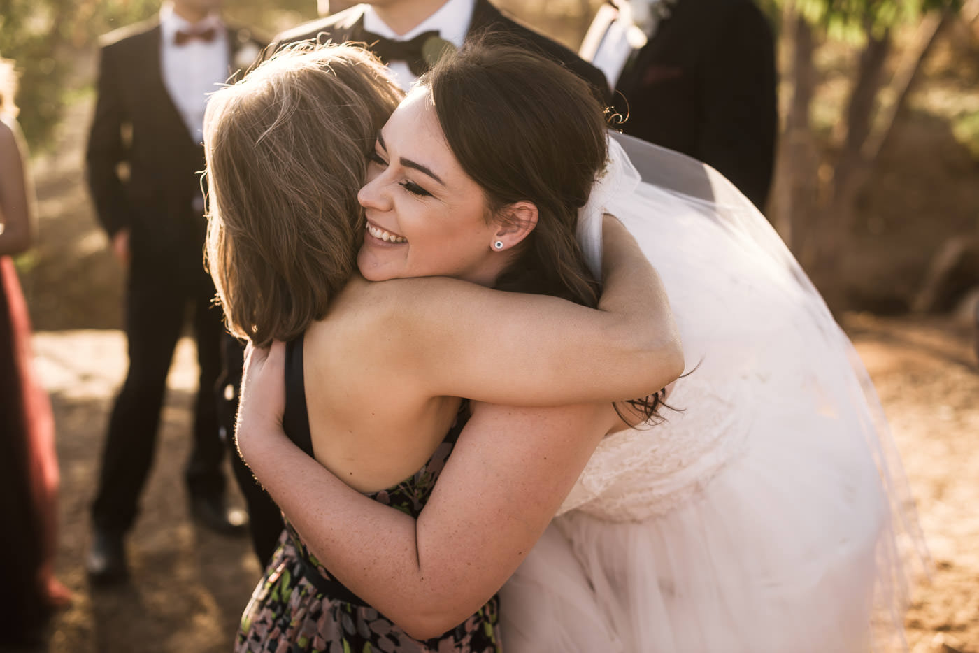 Bride hugs her new mother in law after the wedding ceremony.