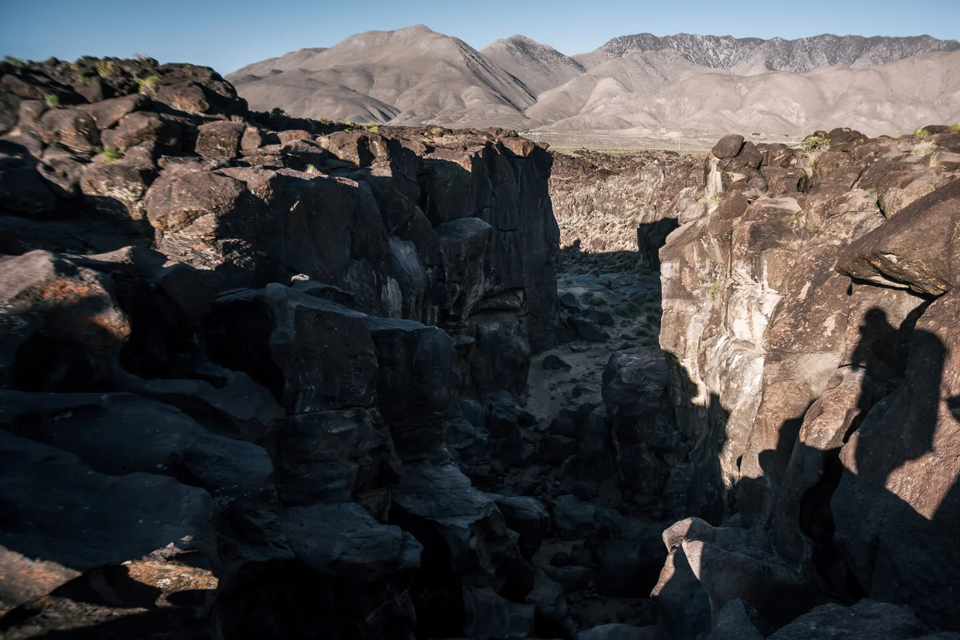 The red volcanic sand of the dry lake volcano near Fossil Falls.