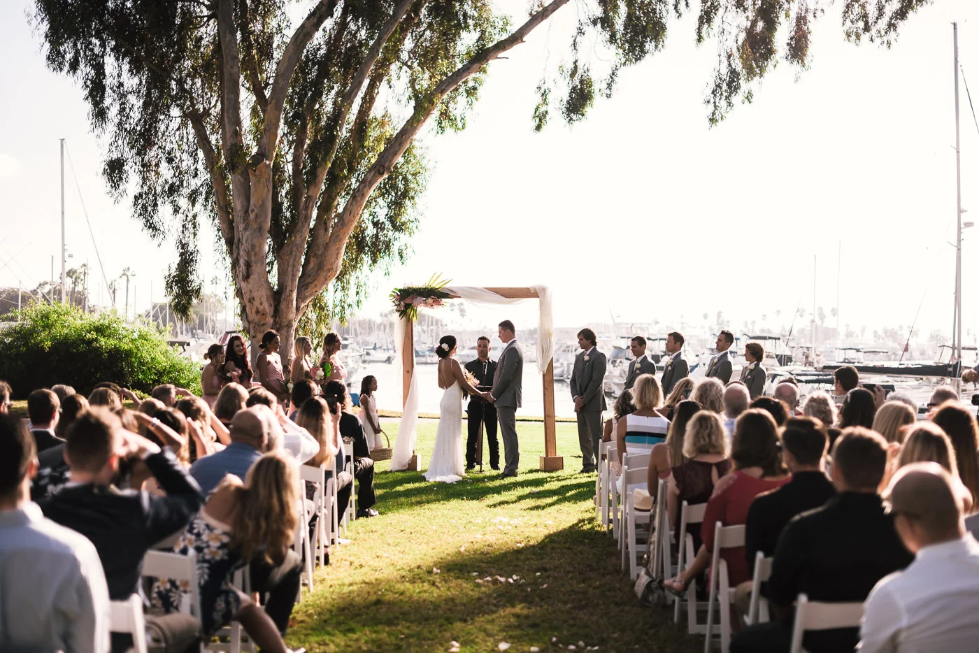 Wedding ceremony at sunset in Marina Village.
