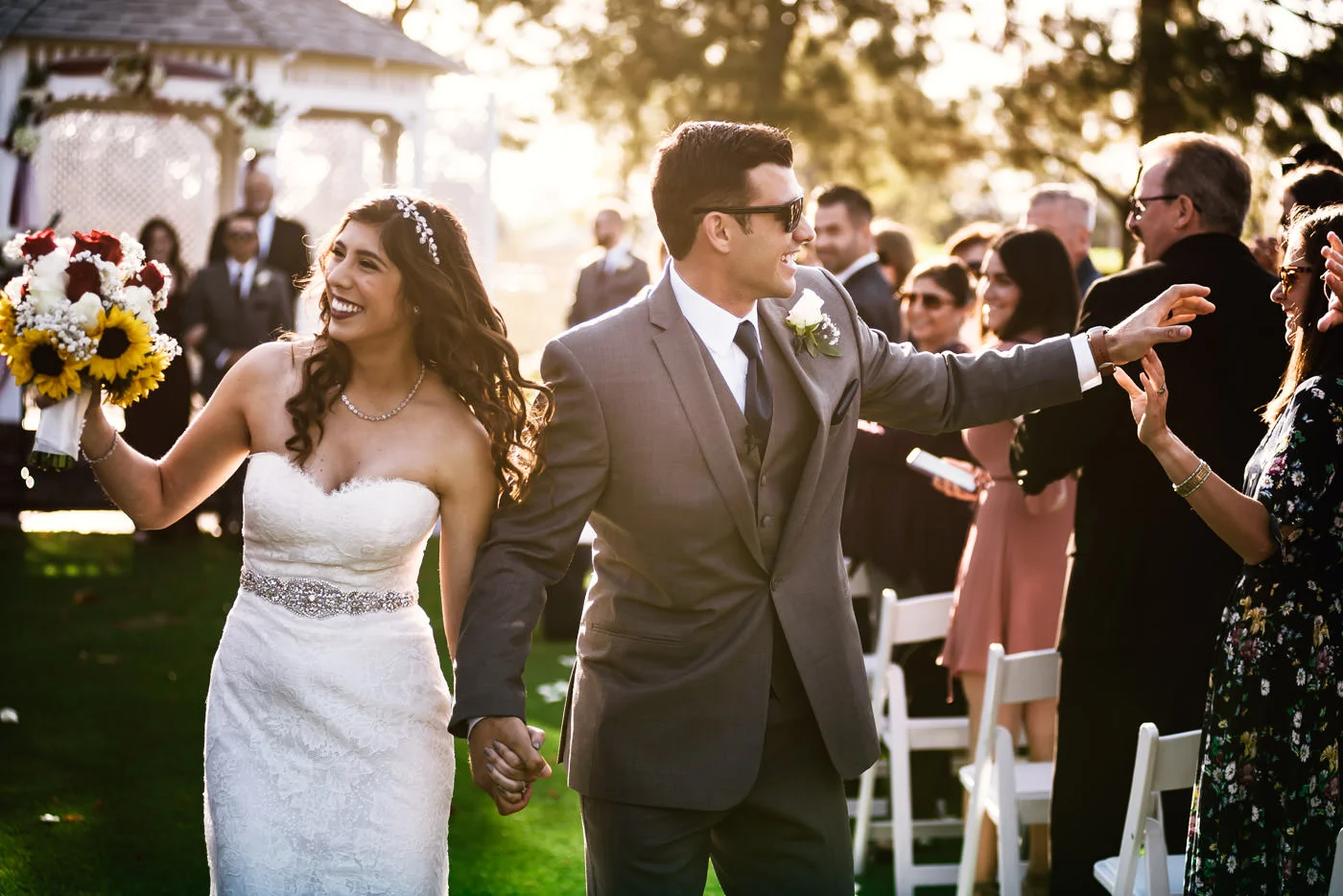 Newlyweds walk down the aisle as husband and wife.