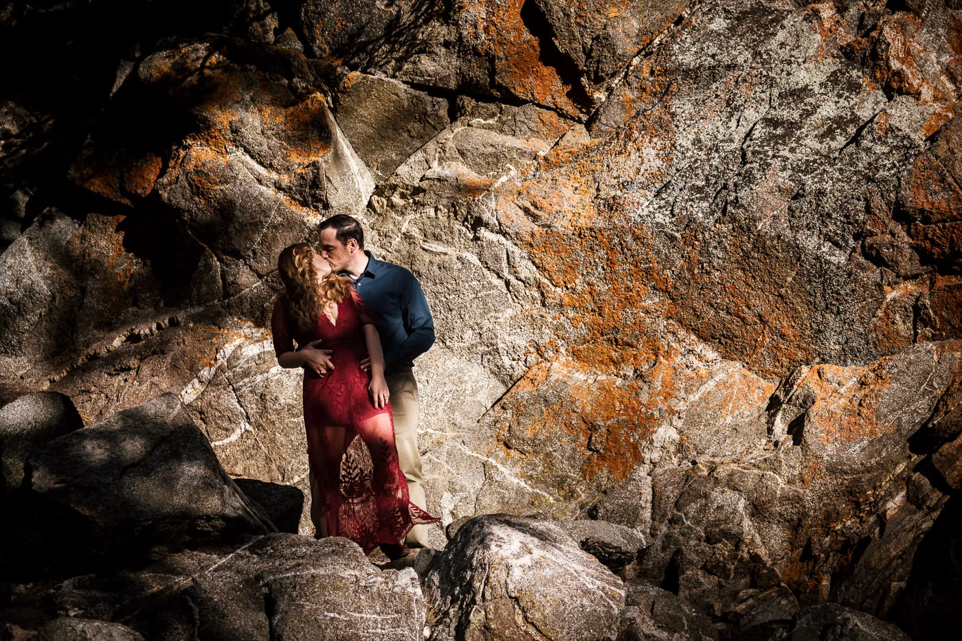 Tender kiss between these two lovebirds in the mountains of southern California.