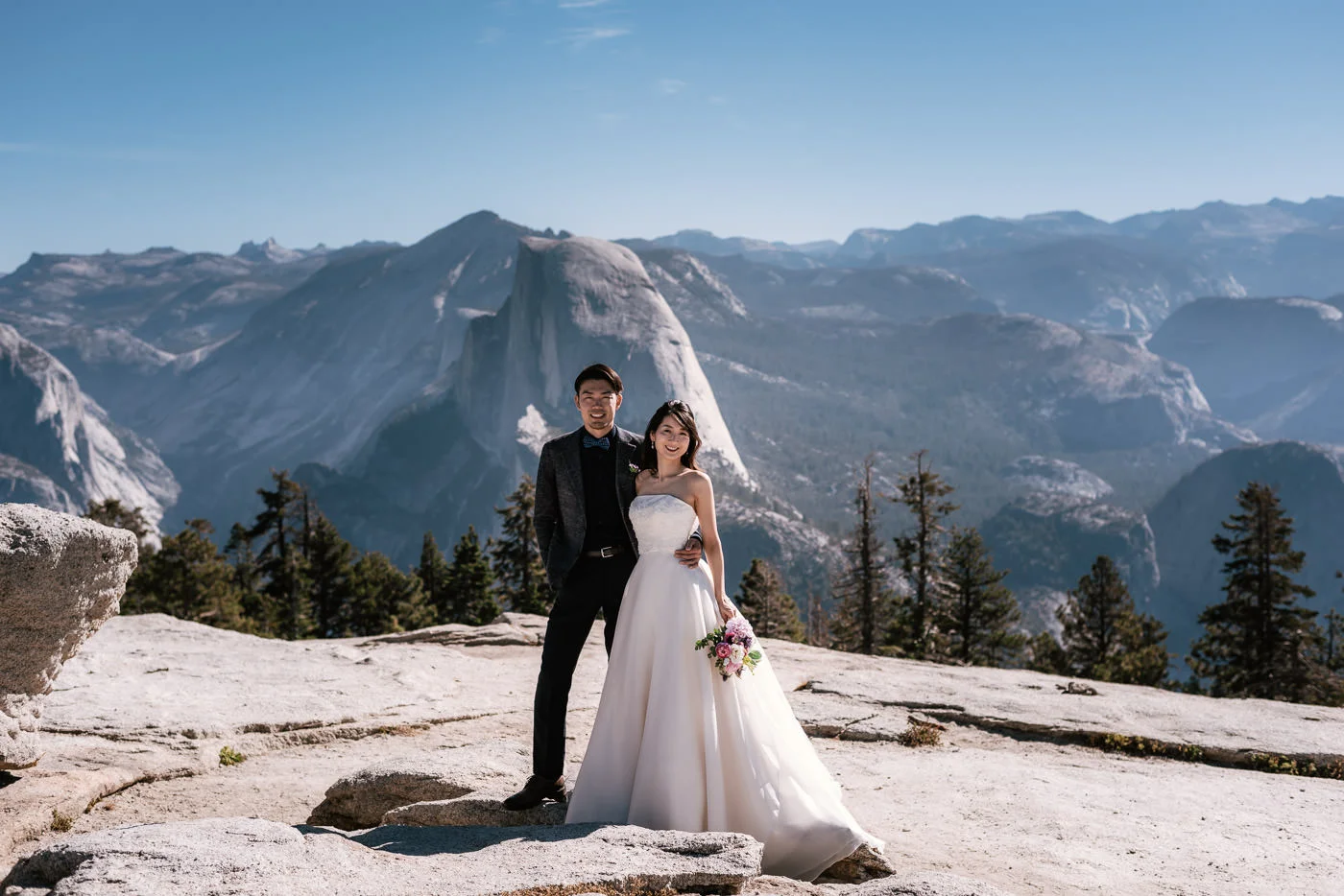 Beautiful wedding photo in front of the world famous Half Dome.