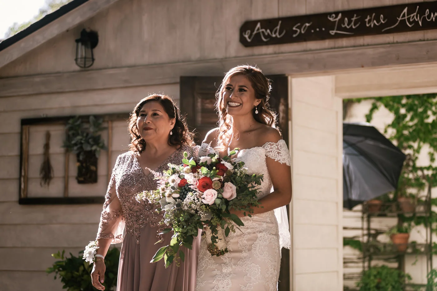 Bride makes her entrance with her mother and walks down the aisle.