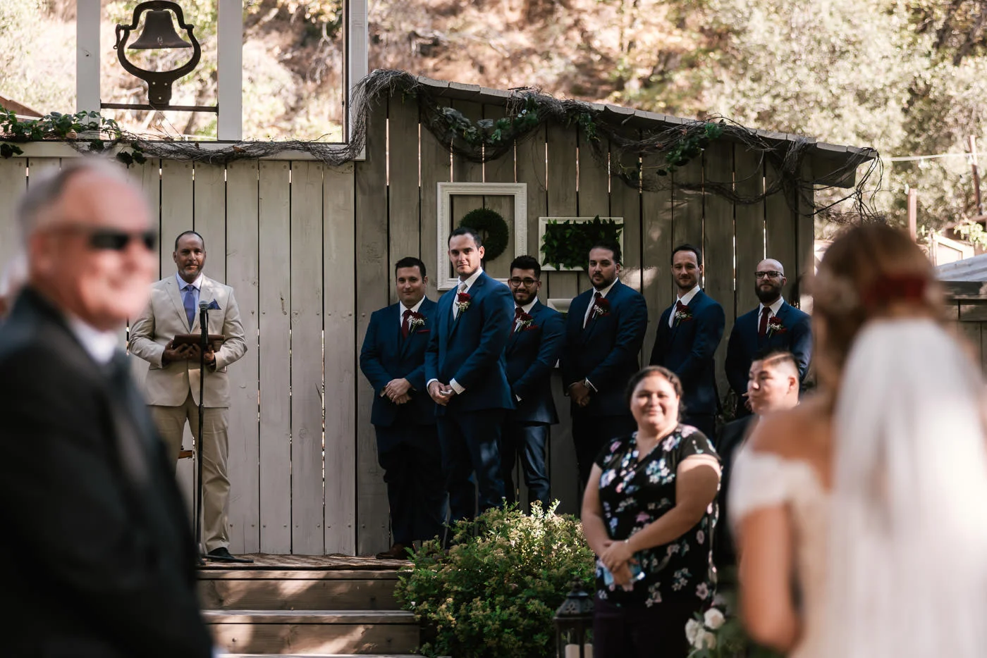 Groom sees his soon to be wife in her wedding dress for the first time.