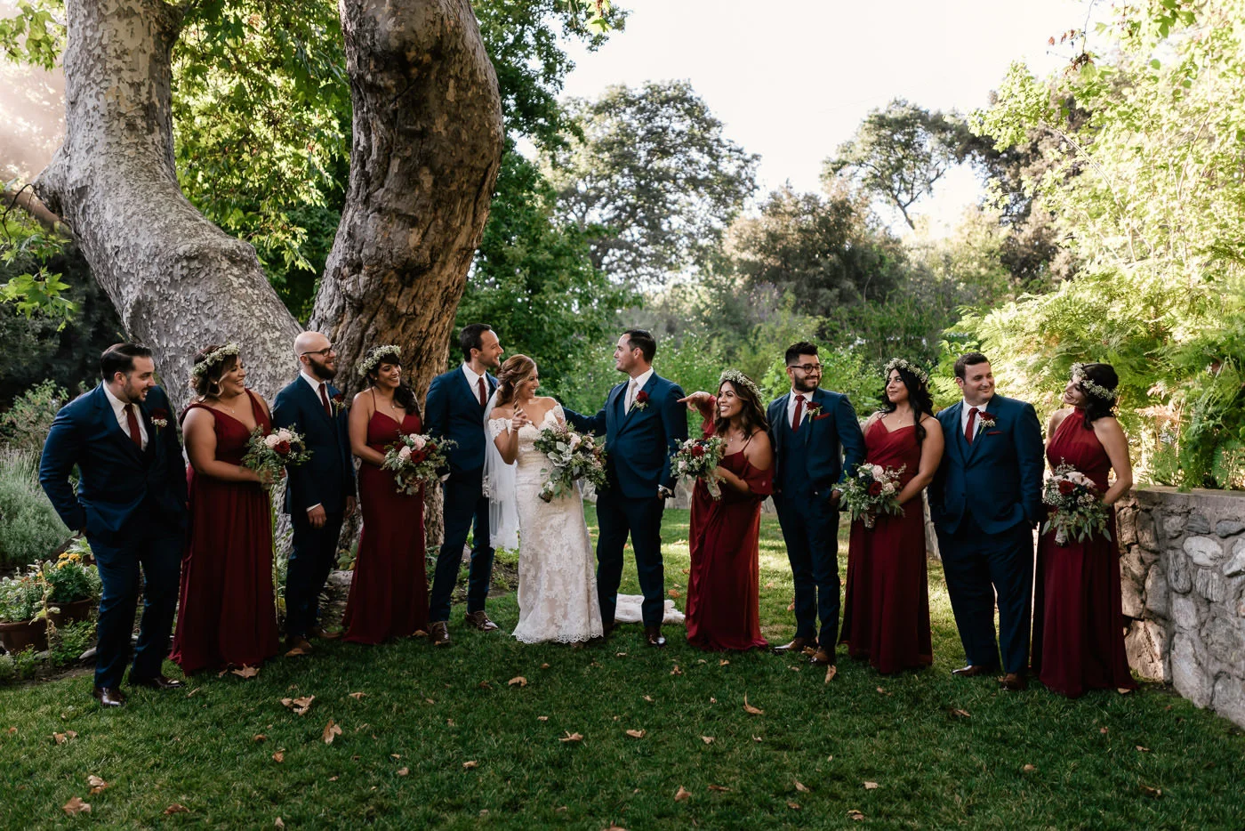 Bridal party relaxes and has a little fun during their photo session.