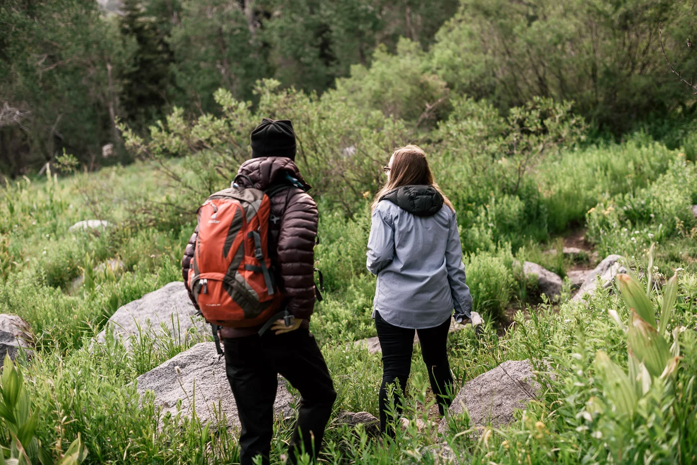 adventerous couple hikes into the wilderness of mineral king with their photographer for a romantic engagement session in Sequoia National Park