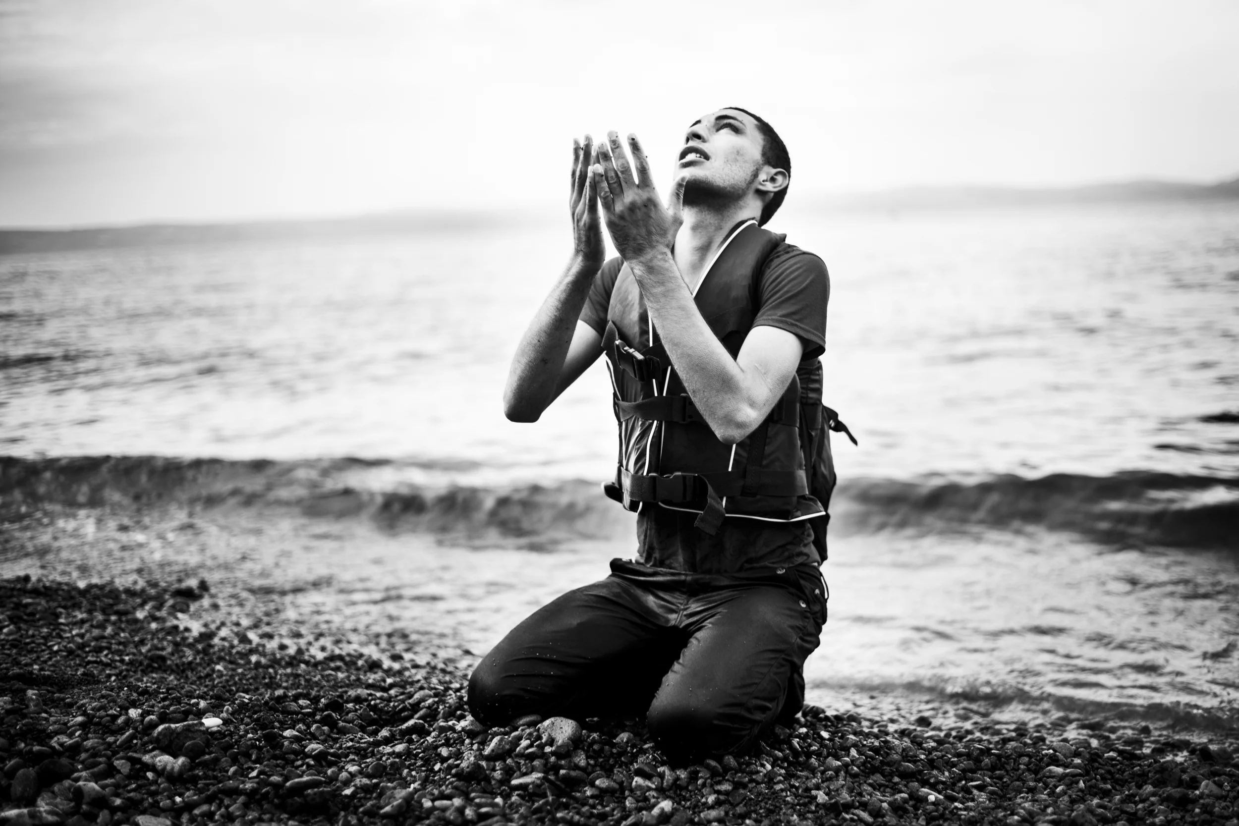 A young man falls to his knees on the beach. It�s September 9th 2015 and he�s thanking the higher powers that he has survived the rubberboat crossing from Turkey to Greece. Other refugees hug while cheering and crying. A woman collapses from exhaustion while her child screams. Boat number 26 of the day has reached the shore at the small village of Skala Sikamineas on the Greek island Lesvos.
The refugee crisis in Europe has been called the worst since the Second World War. 2015 was the year, where a large majority of Europeans for the first time realized just how serious the crises has become. According to the International Organization for Migration (IOM) hundreds of thousands of people have fled towards Northern Europe - almost half crossing the Aegean Sea and into Greece. Over the summer Lesvos became the main gate to the European Union, where local volunteers at the northern beach counted upwards of 60 boats a day filled to the brim with men, woman and children of all ages.