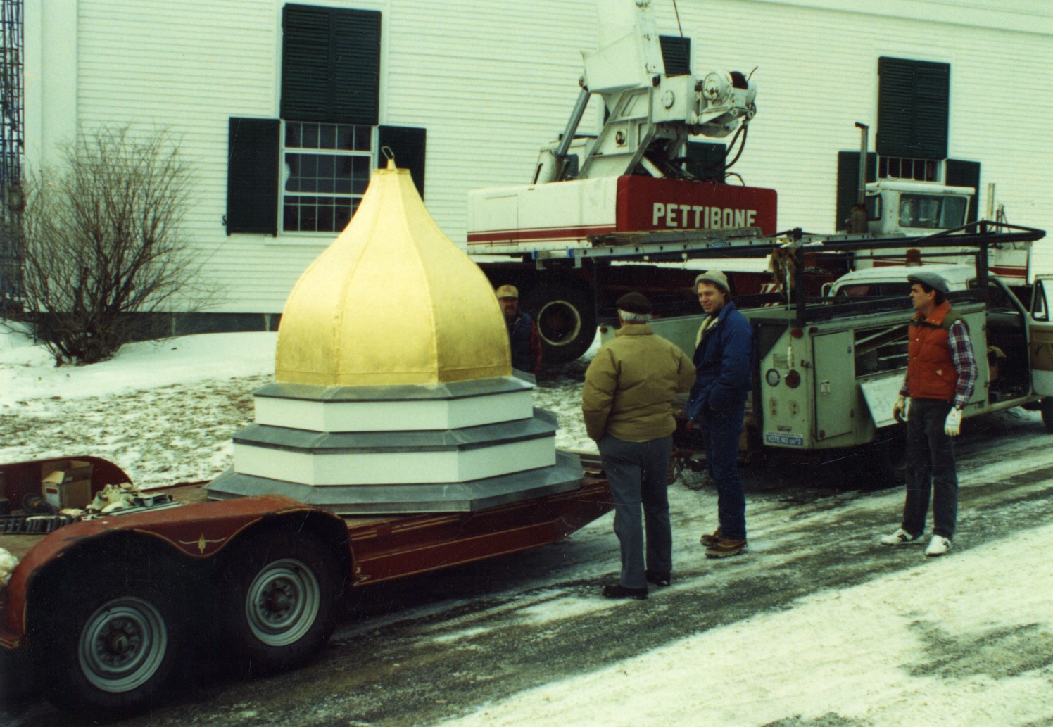 Two cupolas with an eight sided dome atop