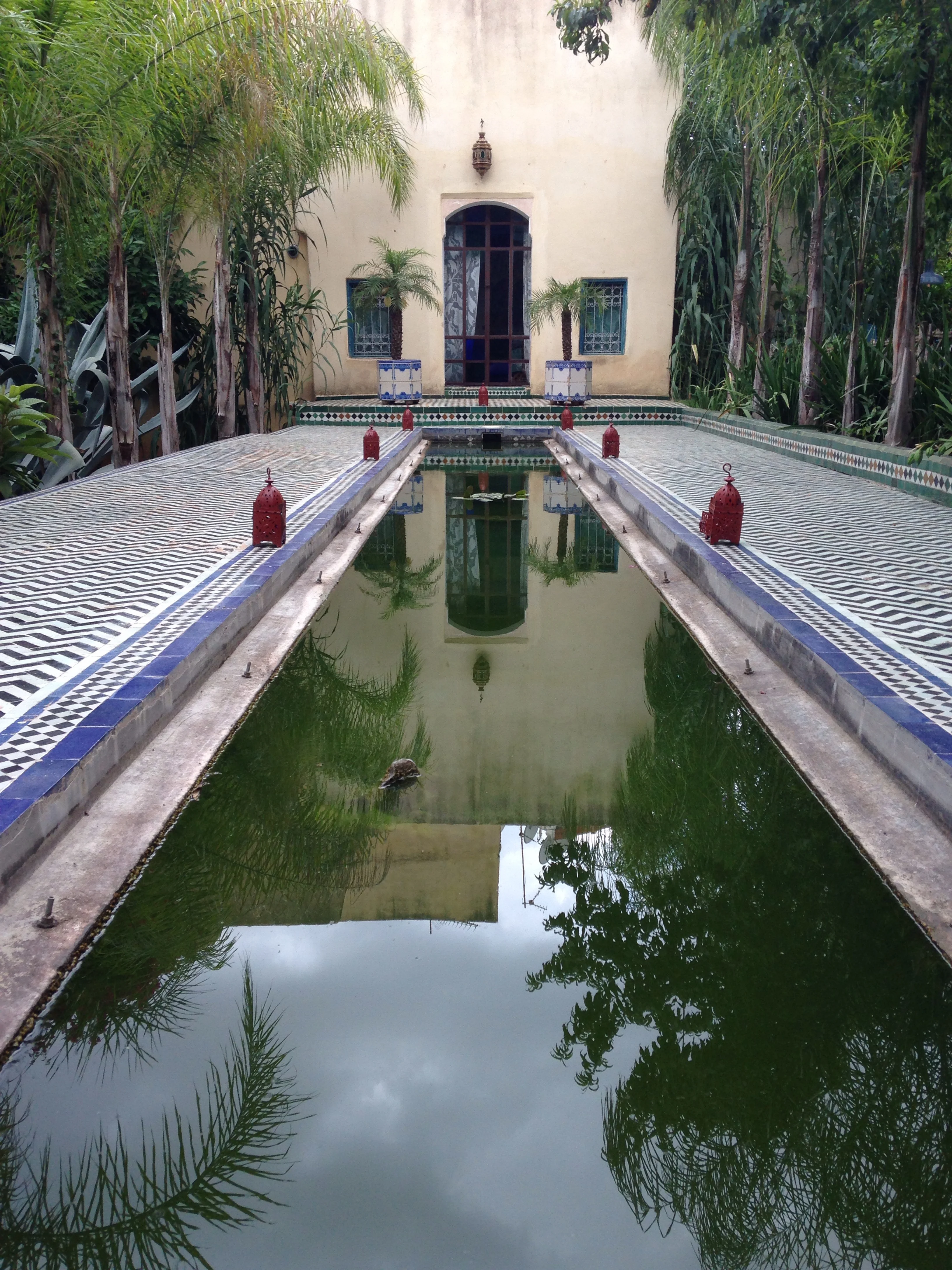 Inside the courtyard of a a large guest house and restaurant.