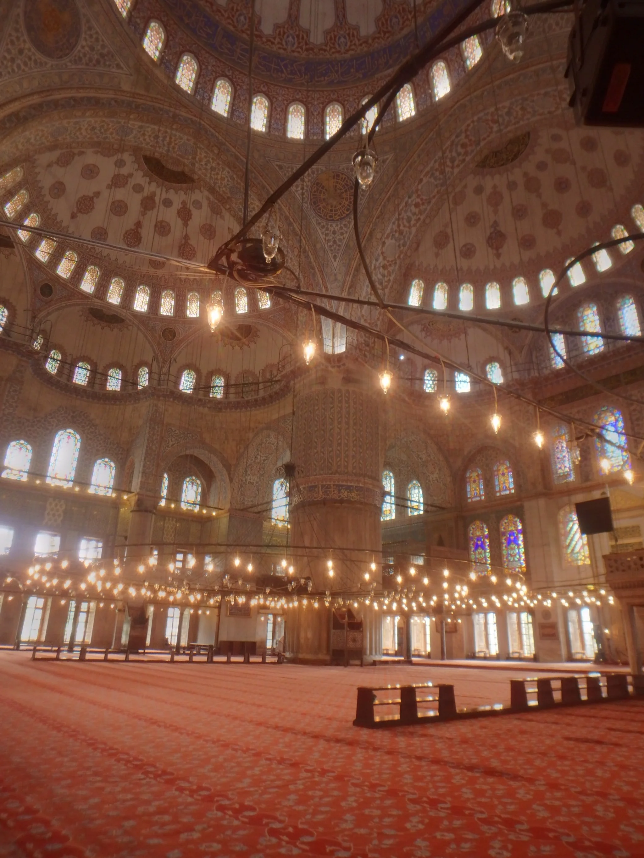 Inside the Blue Mosque. It doesn't look very blue here but it's quite lovely!