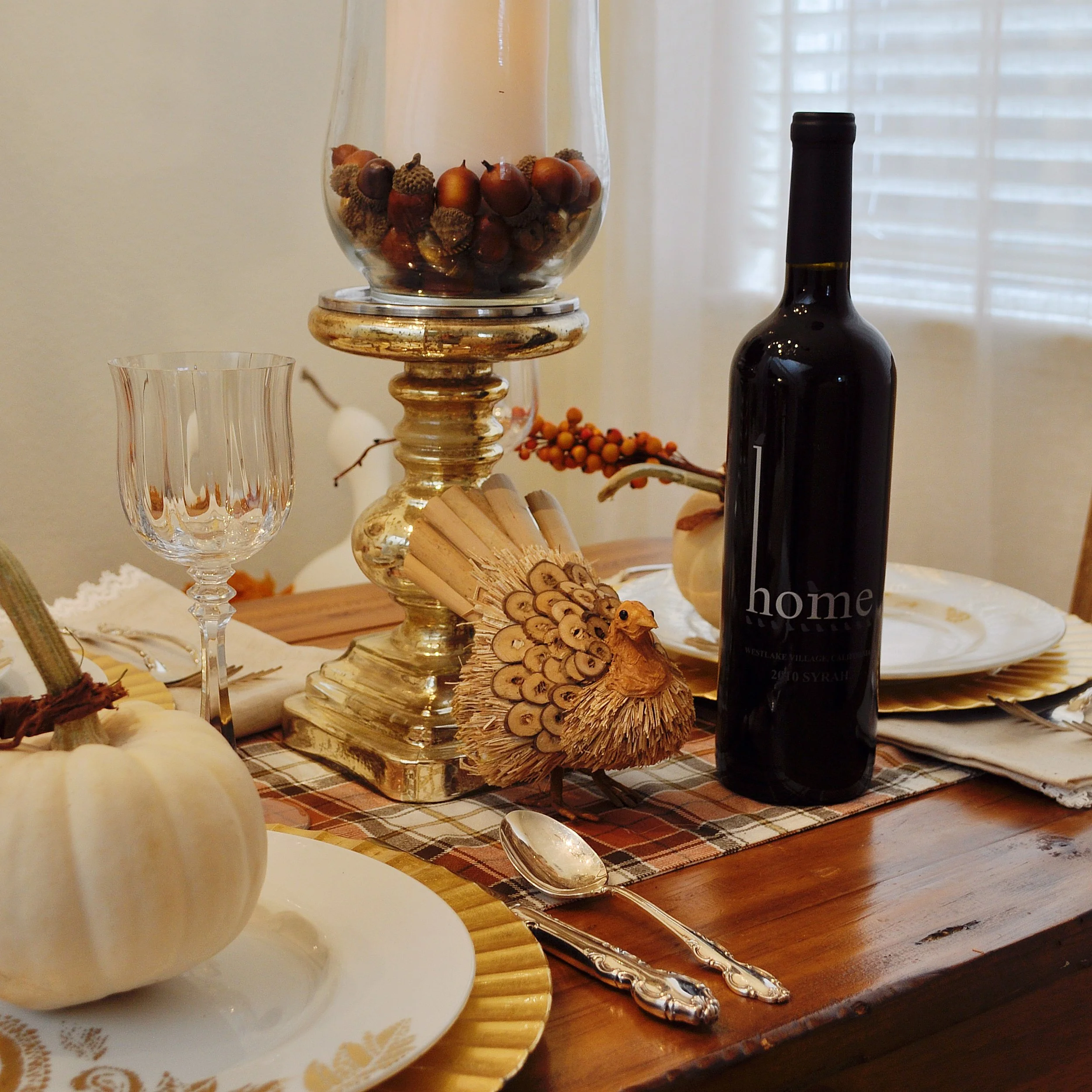 I appreciate having the little touches for fall out too; like acorns surrounding the candles.