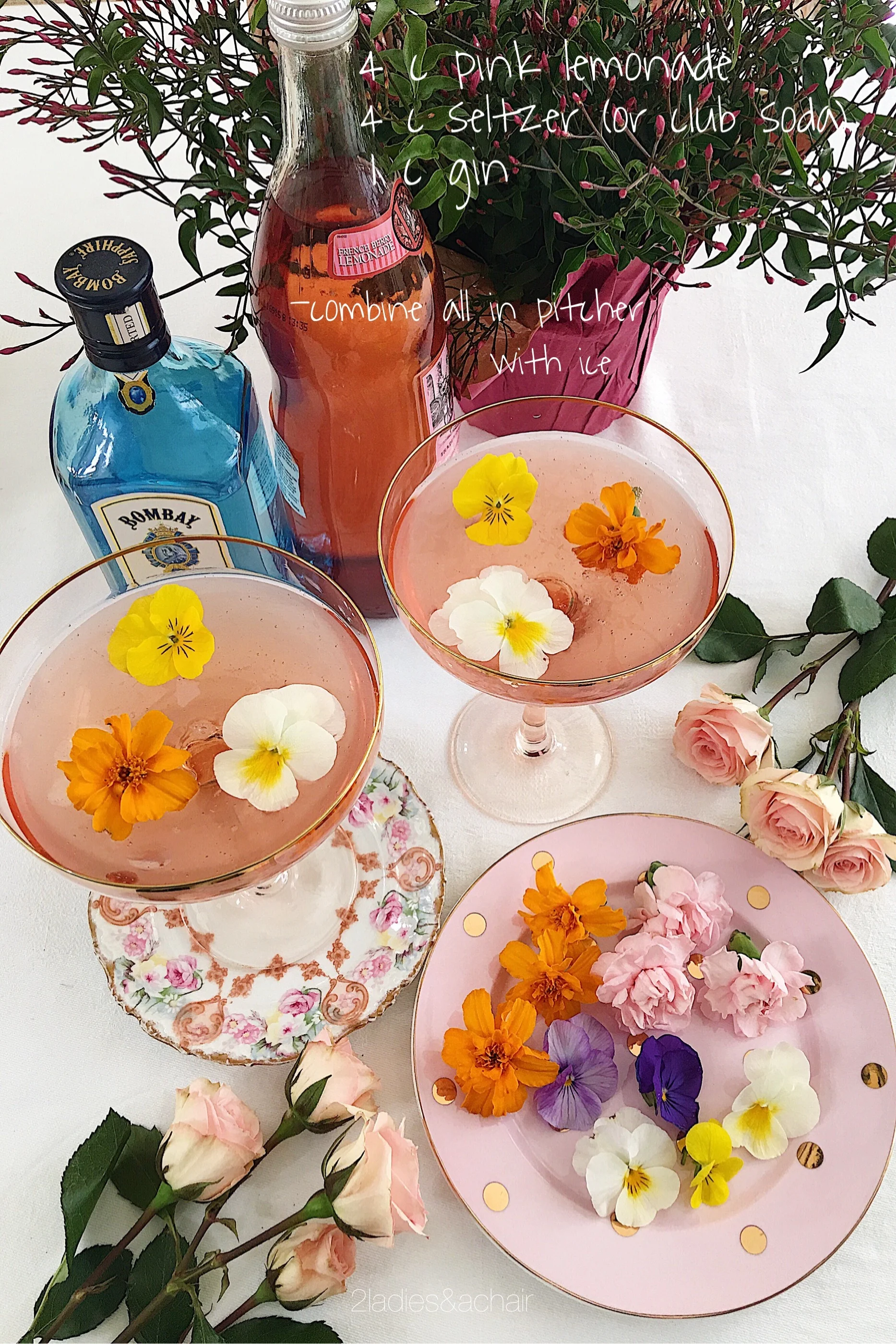 Edible, pesticide free flowers like violas, carnations, marigolds, and nasturtiums are pretty floating on top of punch bowl or individual glasses. Google for more edible flower choices. Add seltzer just before serving.