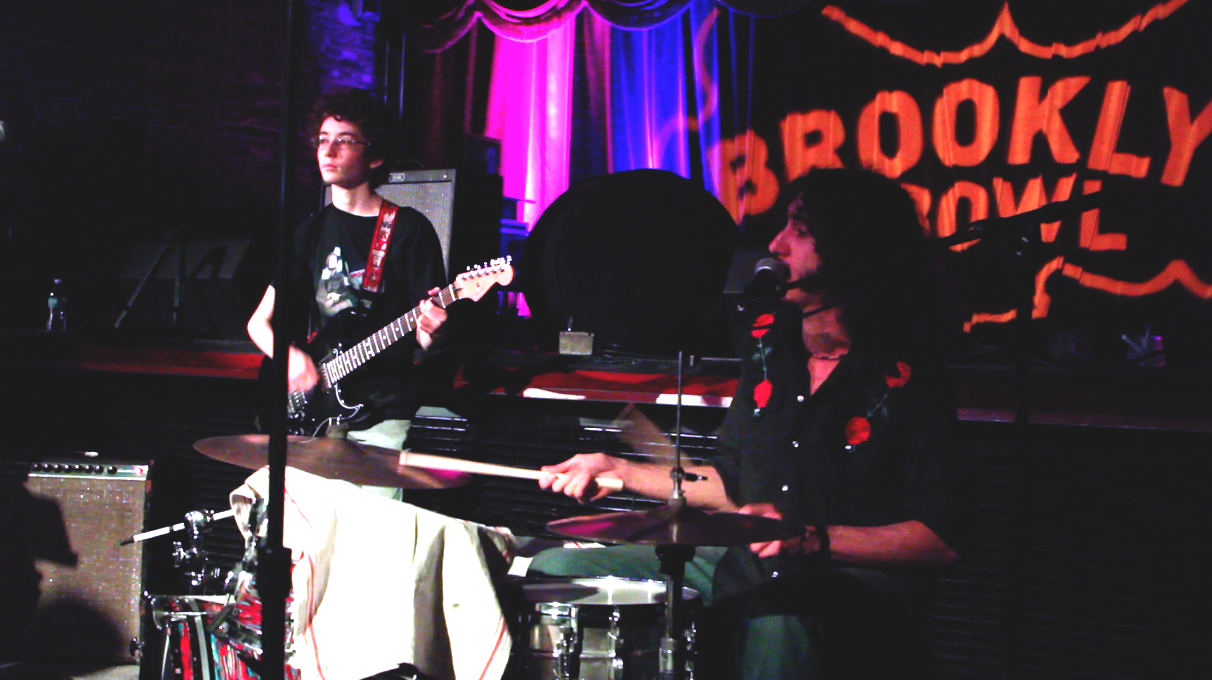 Young guitarist Adam Light sitting in with The London Souls. Photo by Brian Stollery.