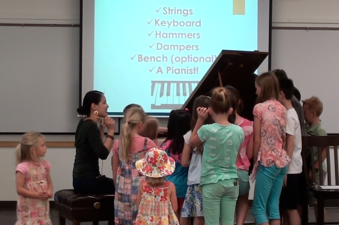 Playing inside of piano with hammers!