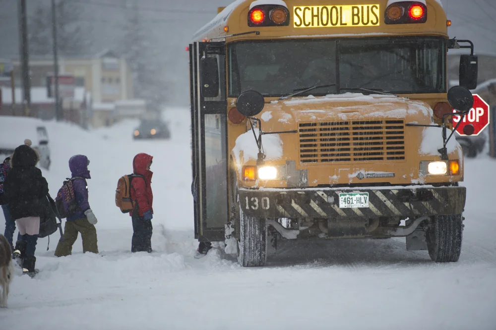 Catching the school bus in a snowstorm in Colorado