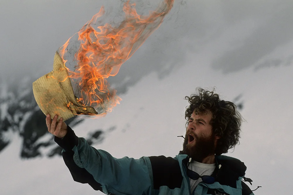 Photo of Topher Donahue in Alaska getting some wild ideas after 25 days of constant storms. Photo by Kennan Harvey