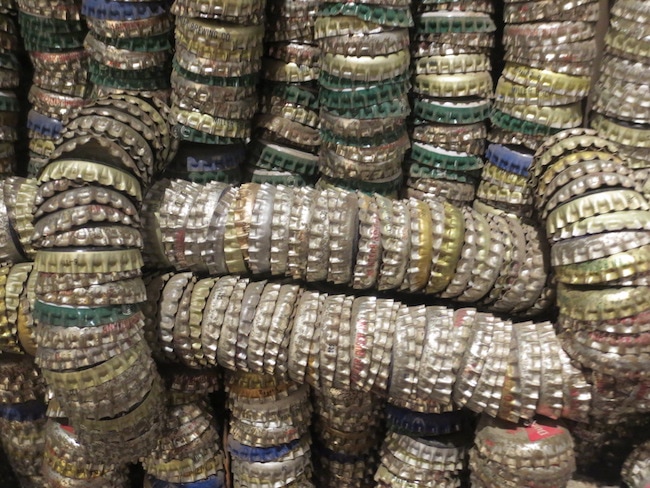 Detail of Bottle Cap Tower and Empire State Building (1992), by Clare Graham.