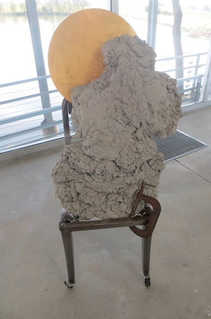 Nimbus (2000), by David Ireland. Steel, concrete, gold leaf, wood panel. Gatehouse Gallery
