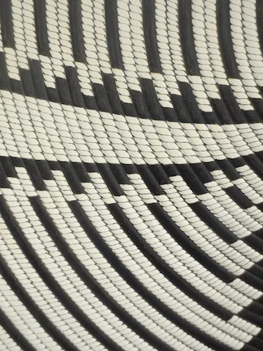 Detail of "Stellar Basket Illusion" (1995), by Lincoln Seitzman. Collection of the Center for Art in Wood, Philadelphia, PA. Fuller Craft Museum, Brockton MA.